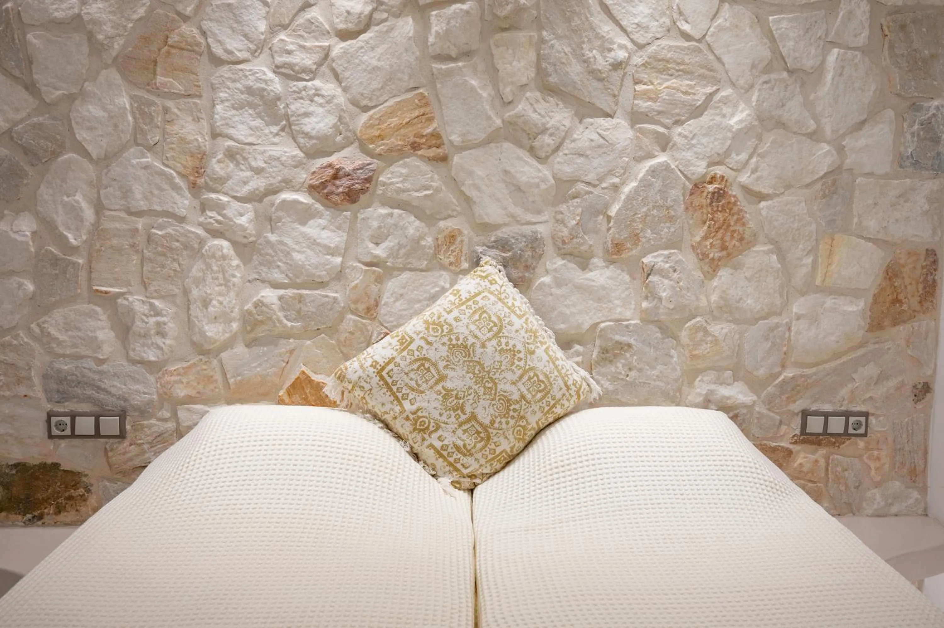 Bed in Katerina Roza Studios - Heartfelt Hospitality in the City