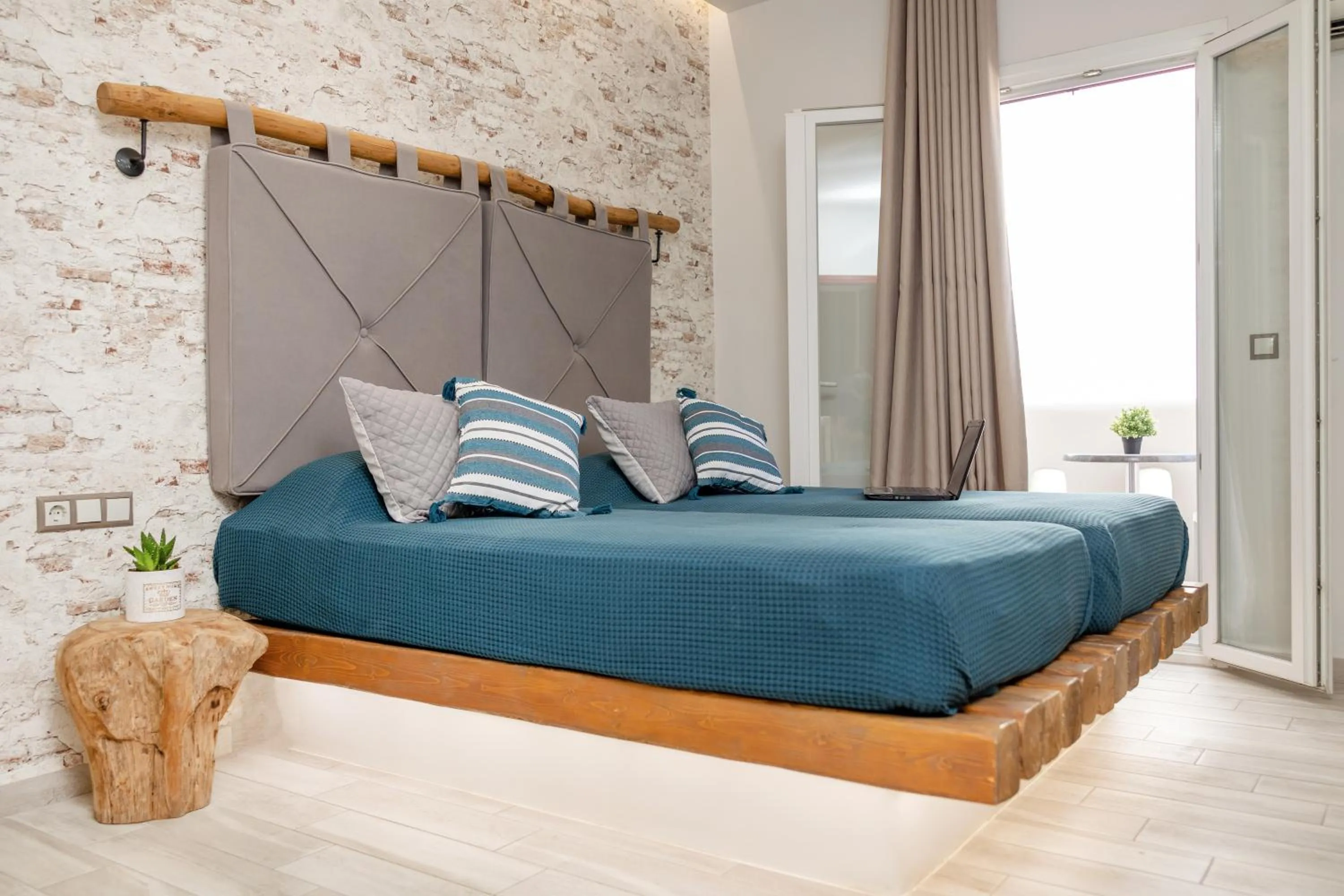 Bed in Katerina Roza Studios - Heartfelt Hospitality in the City