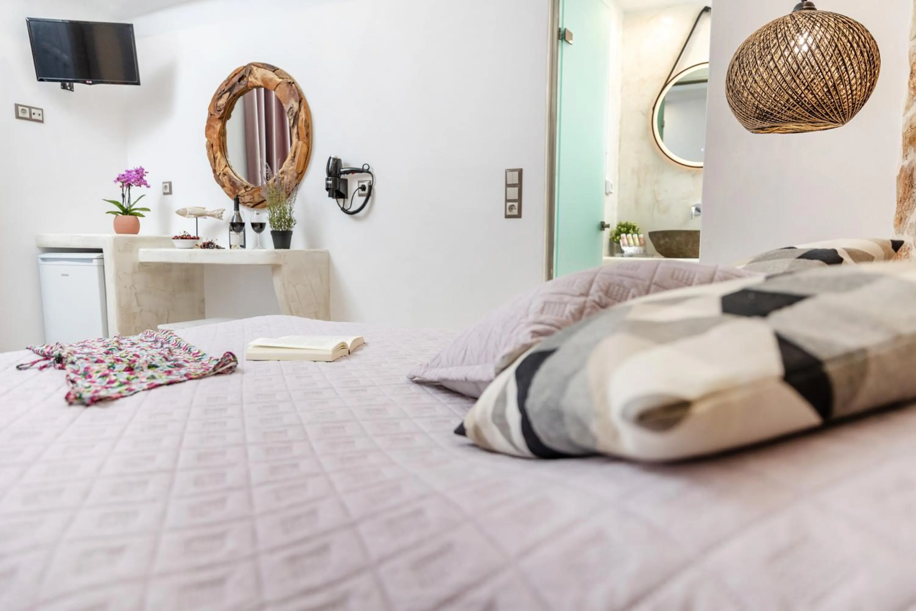 Bed in Katerina Roza Studios - Heartfelt Hospitality in the City