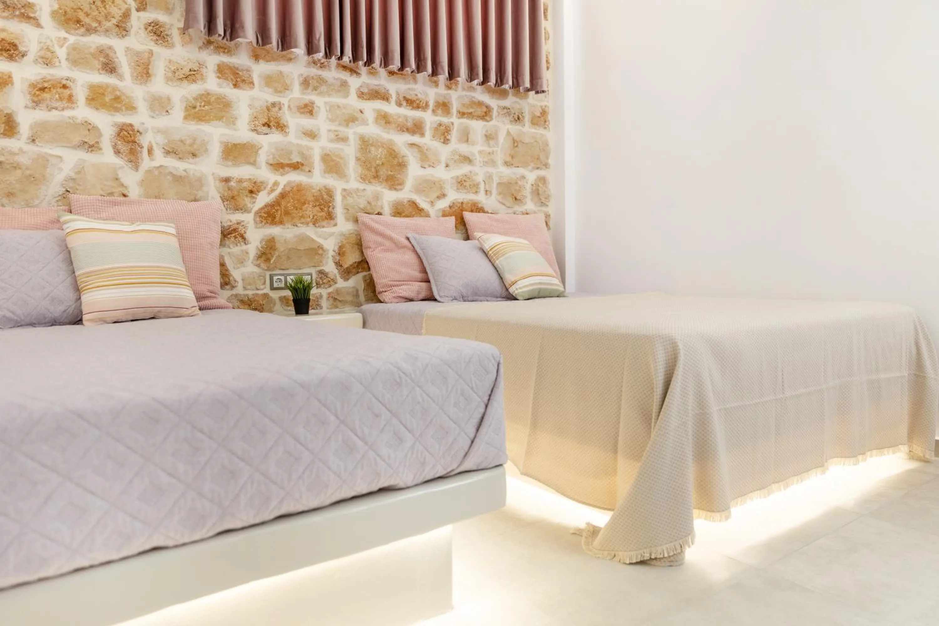 Bed in Katerina Roza Studios - Heartfelt Hospitality in the City
