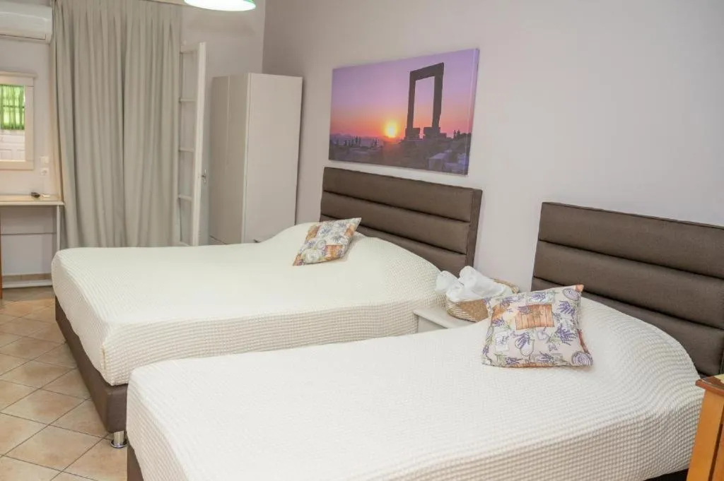 Bed in Katerina Roza Studios - Heartfelt Hospitality in the City