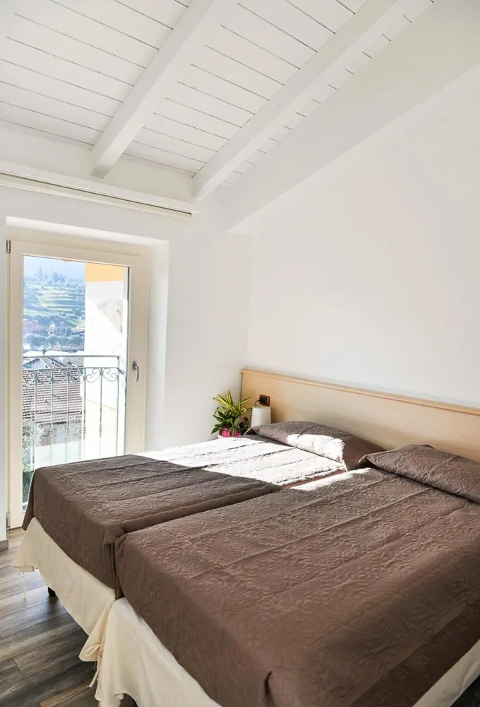 Bed in Albergo Silvio