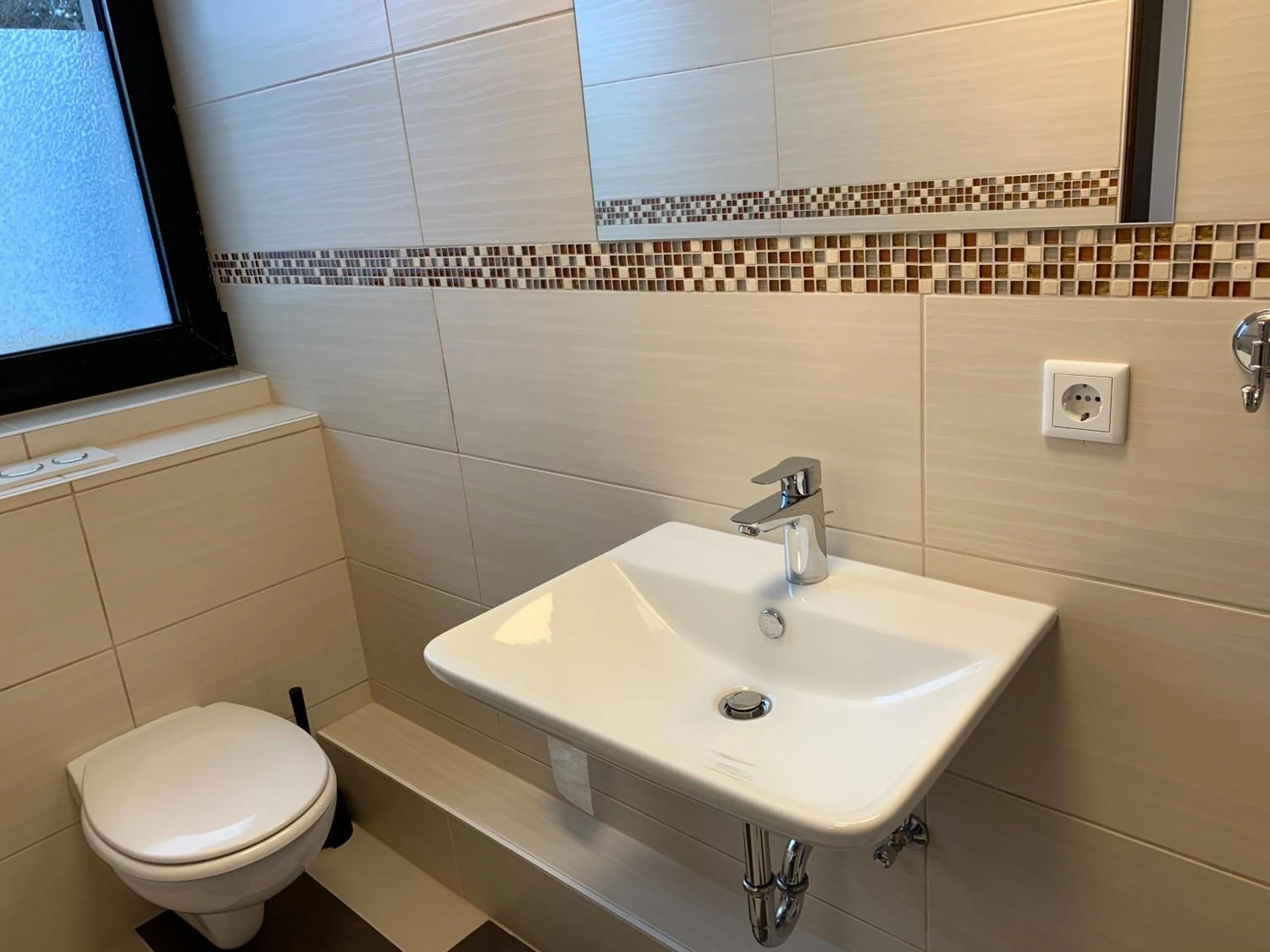 Bathroom in Apart-Hotel Rheinischer Hof Dormagen