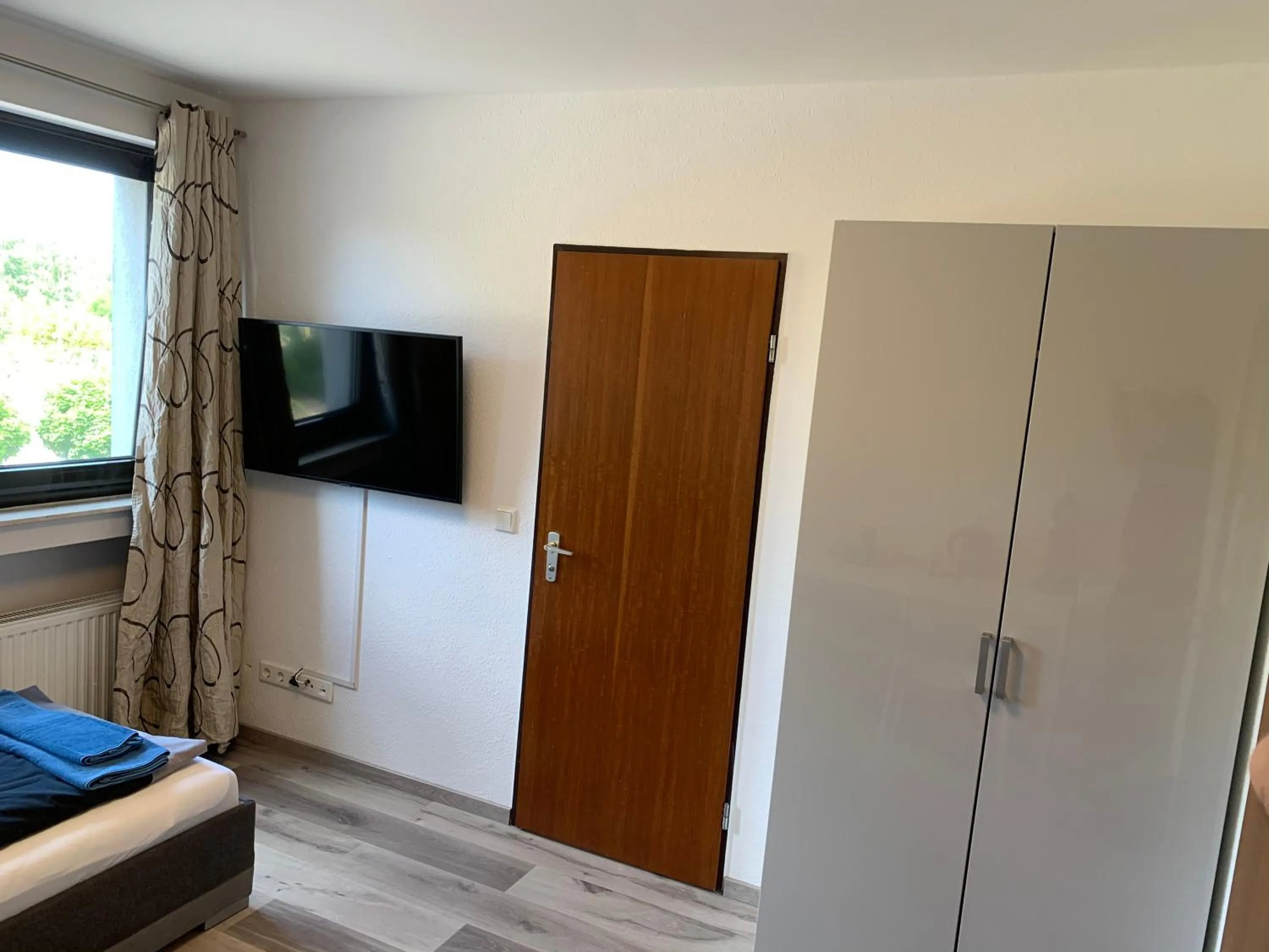 Photo of the whole room, Bed in Apart-Hotel Rheinischer Hof Dormagen