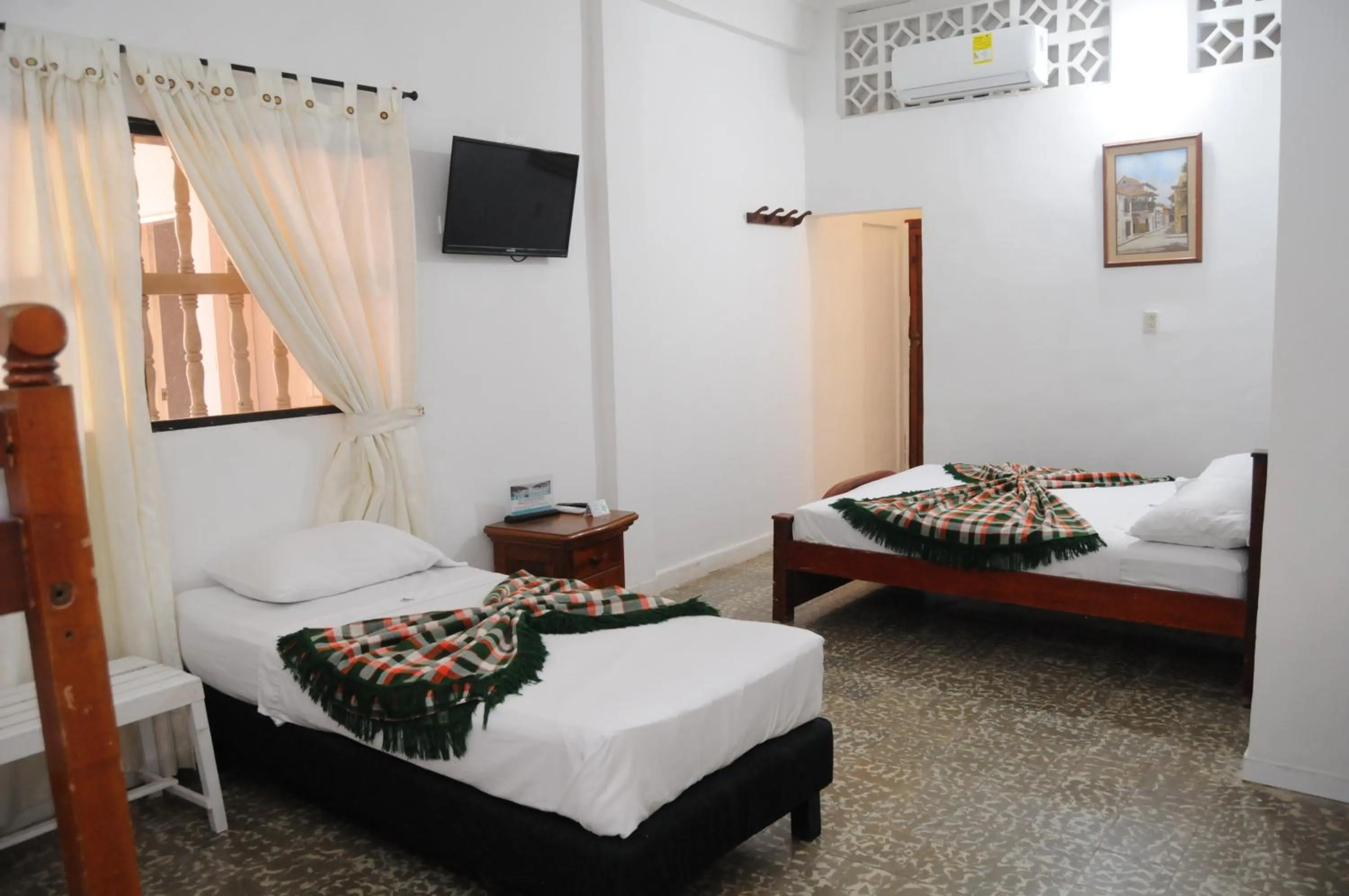 Bed in Hotel Montecarlo Beach