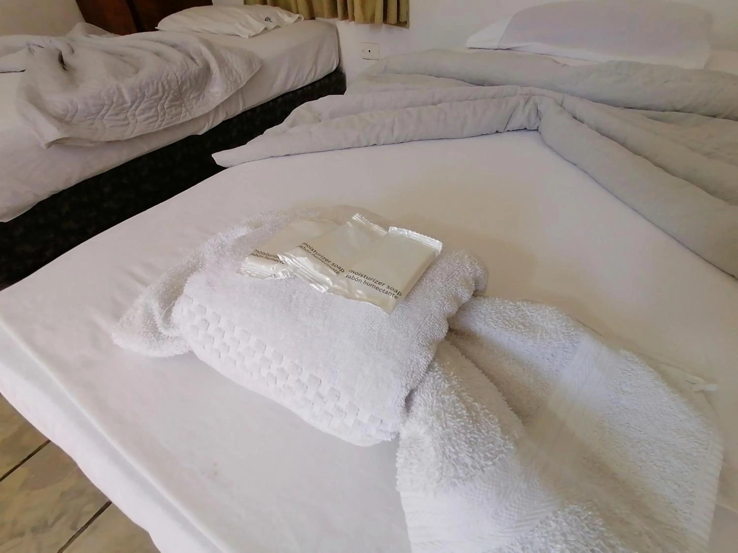 Bed in Hotel Montecarlo Beach