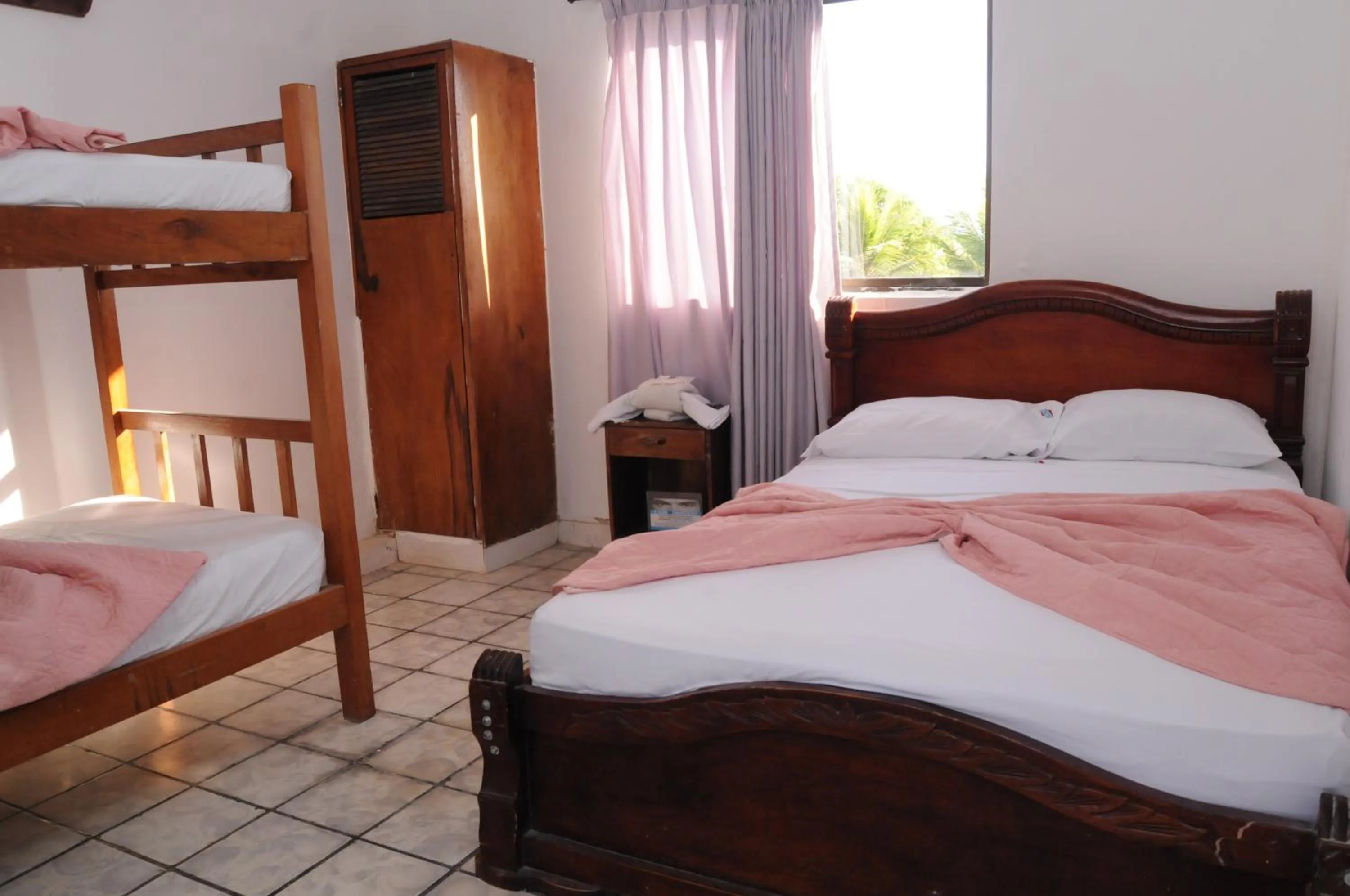 Bed in Hotel Montecarlo Beach