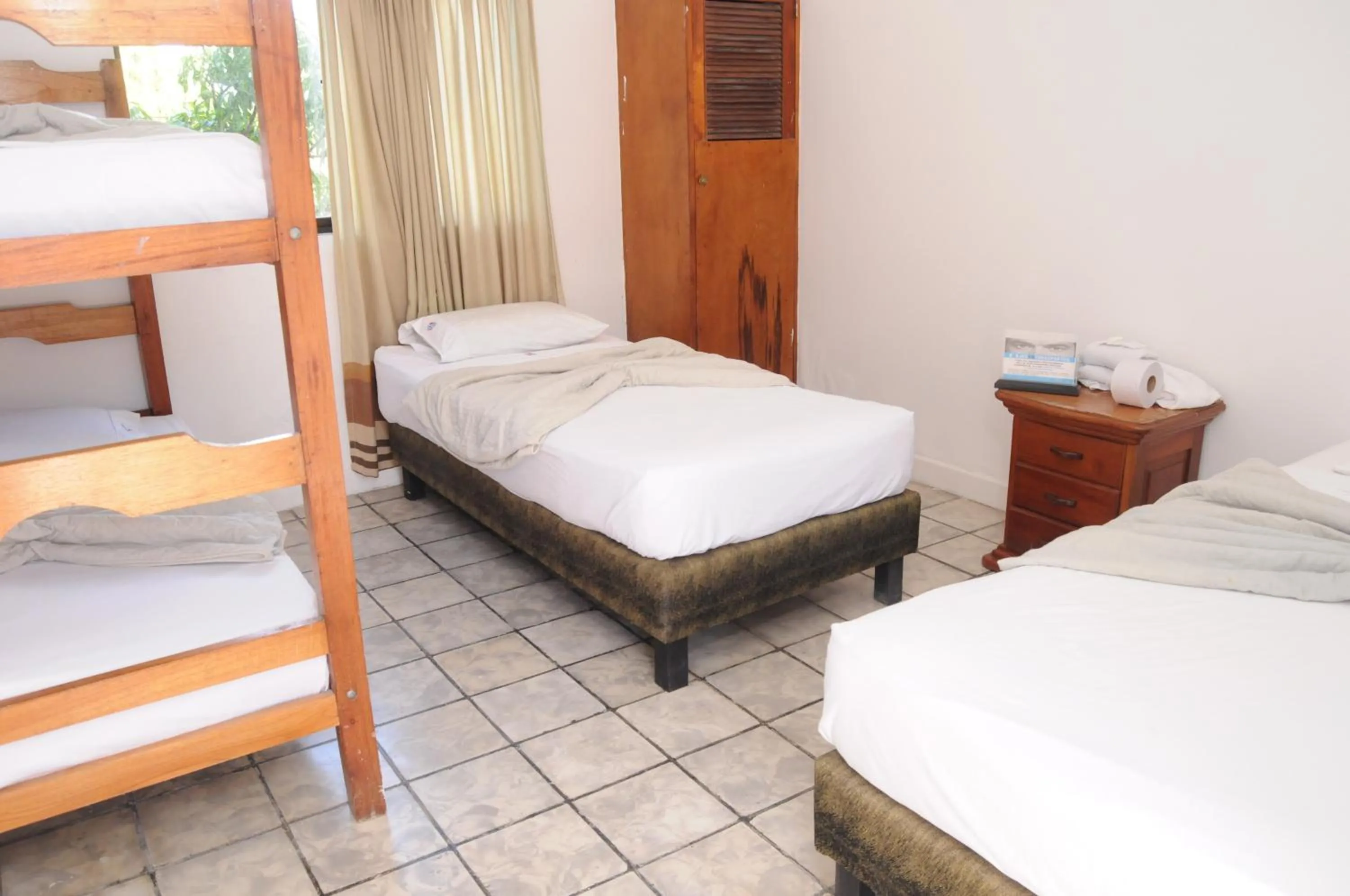 Bed in Hotel Montecarlo Beach