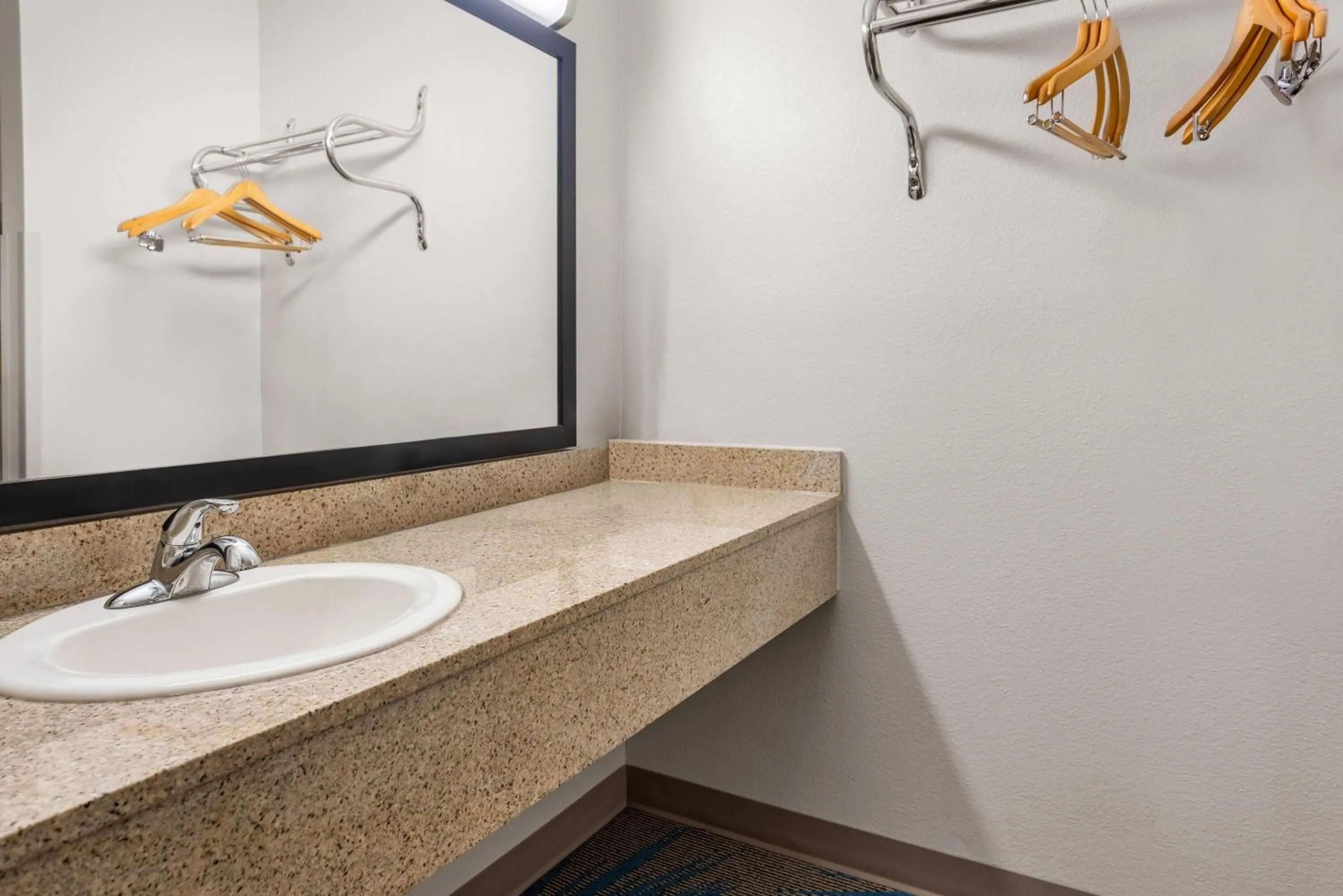 Bathroom in Days Inn by Wyndham Adel I-75