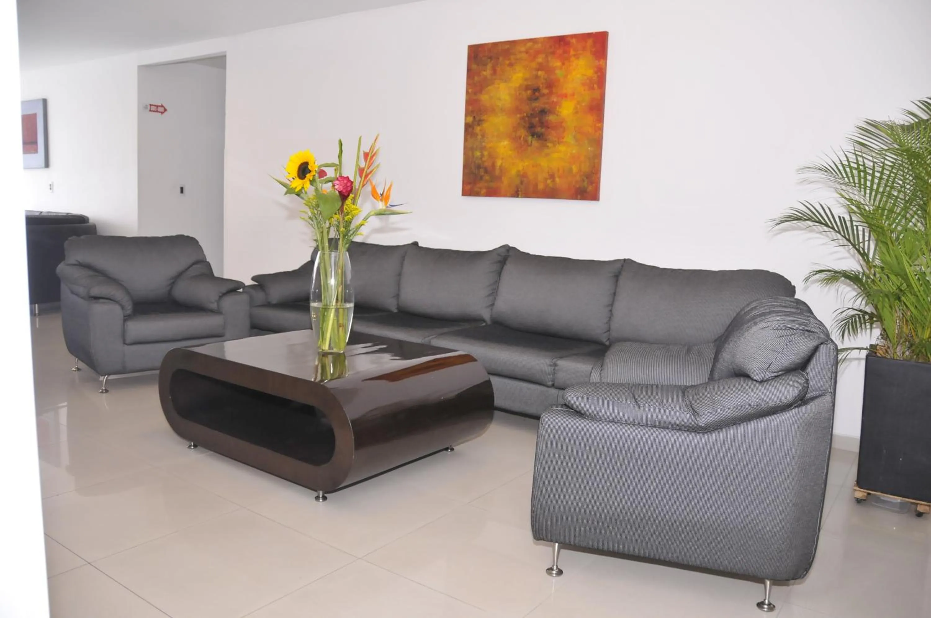 Communal lounge/ TV room in Hotel San José Plaza