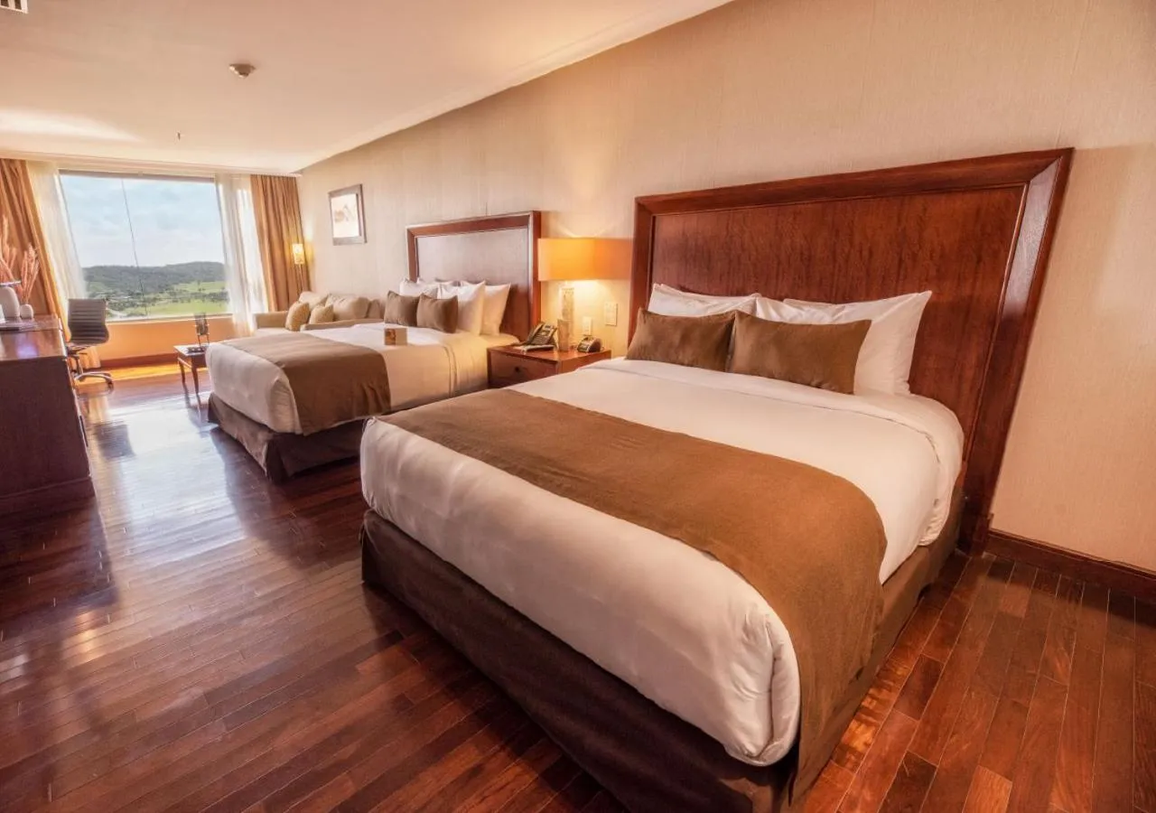 Photo of the whole room, Bed in Hillary Nature Resort & Spa All Inclusive