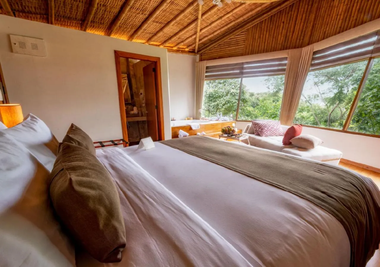 Photo of the whole room, Bed in Hillary Nature Resort & Spa All Inclusive