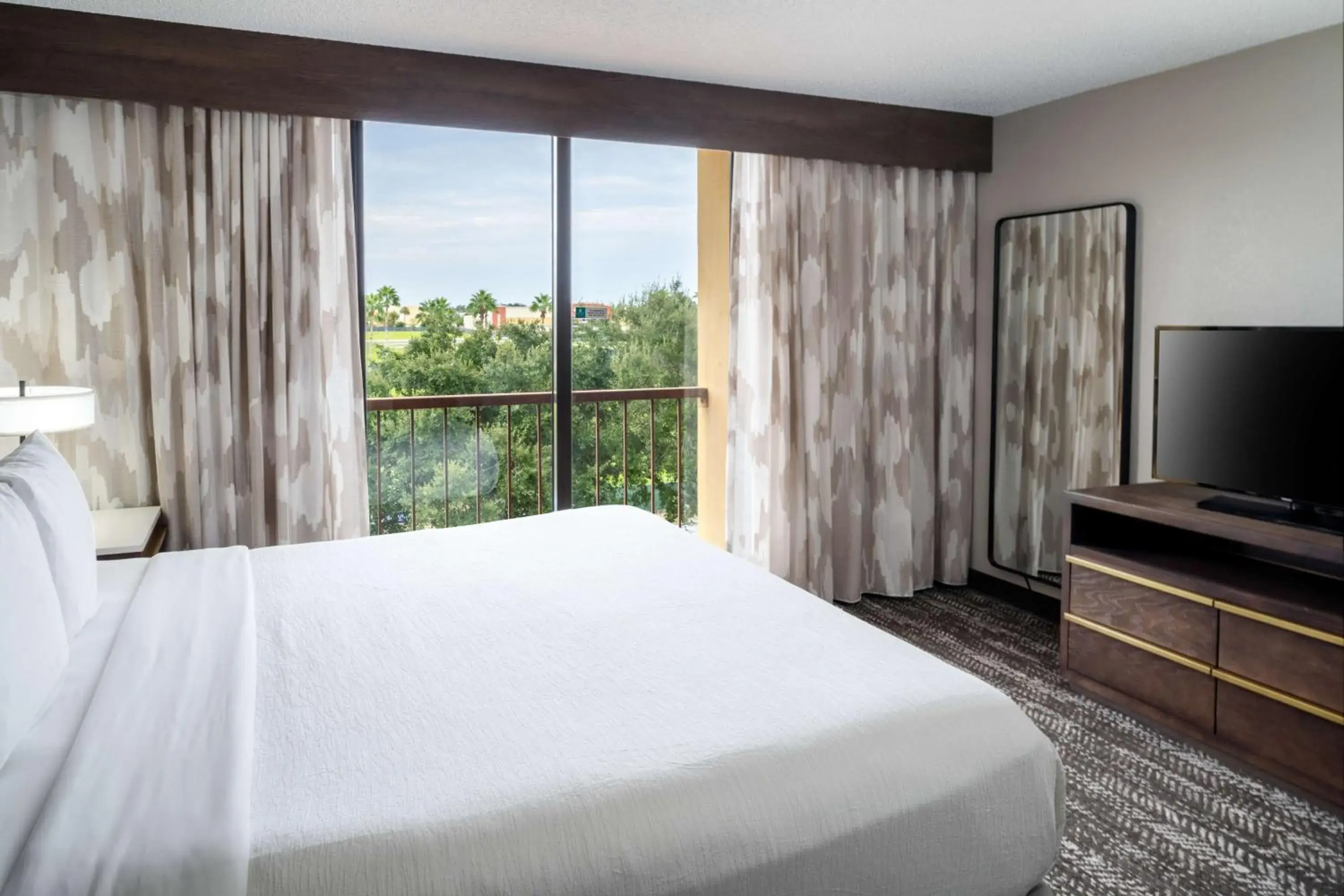 One-Bedroom King Suite with Lake View - Non-Smoking in Embassy Suites by Hilton Orlando North One-Bedroom King Suite with Lake View - Non-Smoking in Embassy Suites by Hilton Orlando North