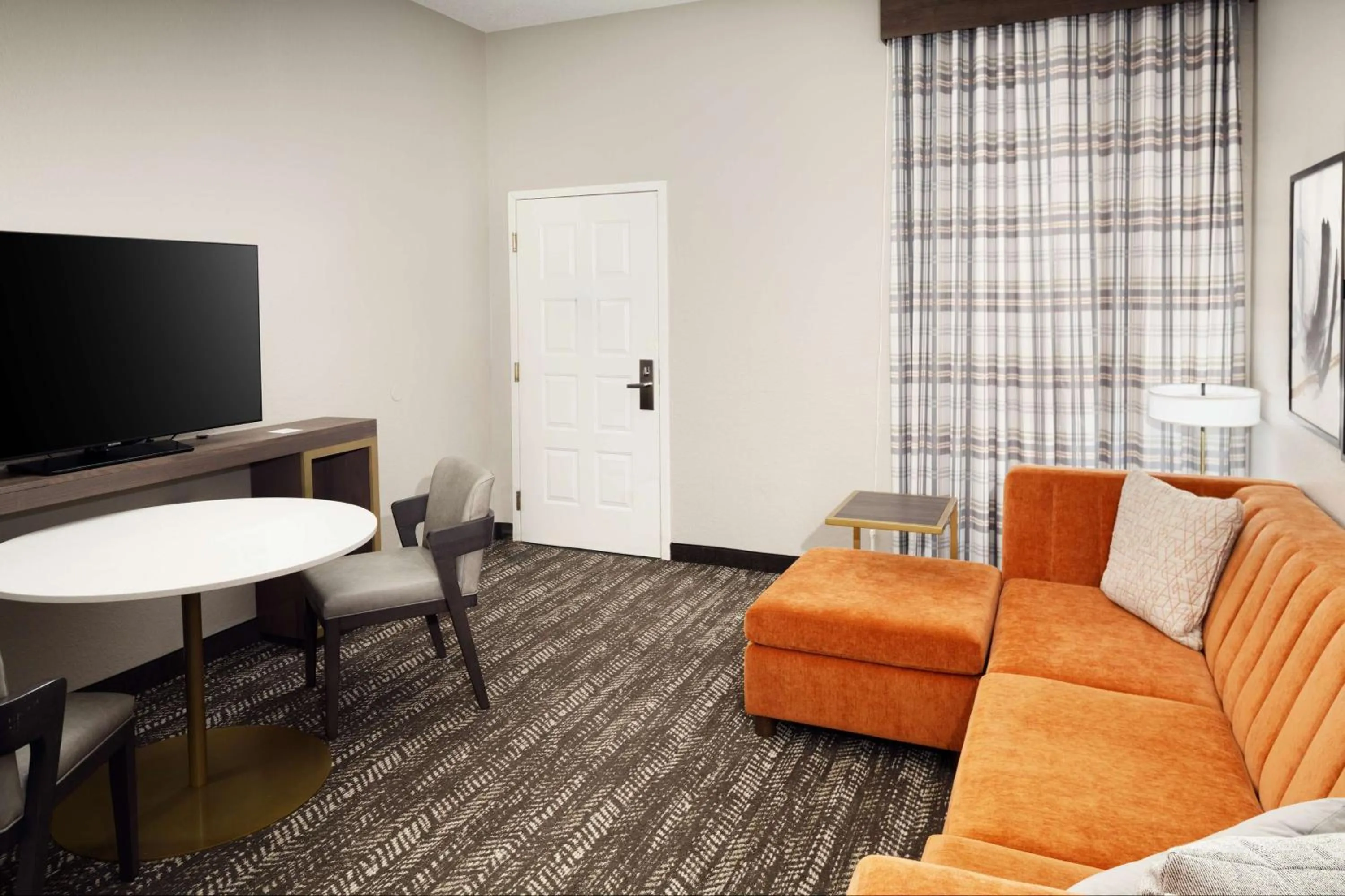 Living room in Embassy Suites by Hilton Orlando North