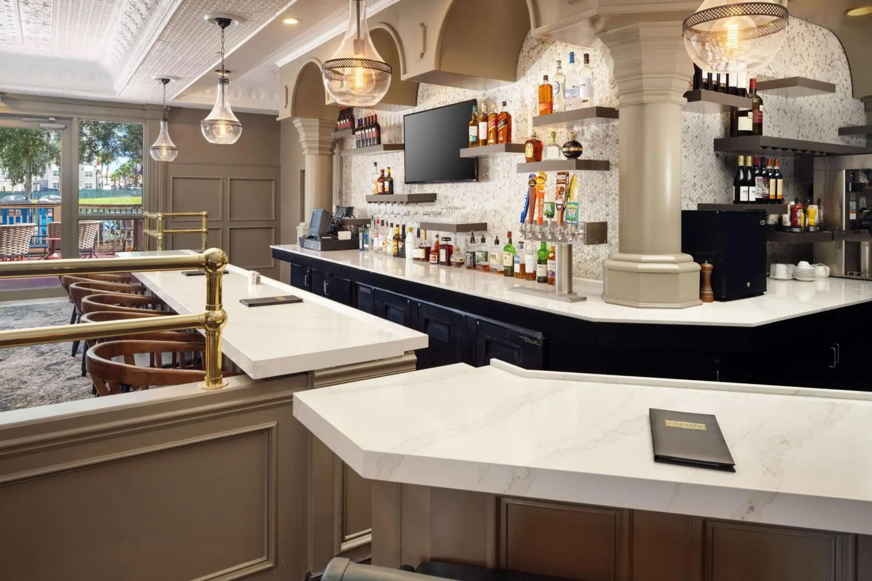 Lounge or bar in Embassy Suites by Hilton Orlando North Lounge or bar in Embassy Suites by Hilton Orlando North