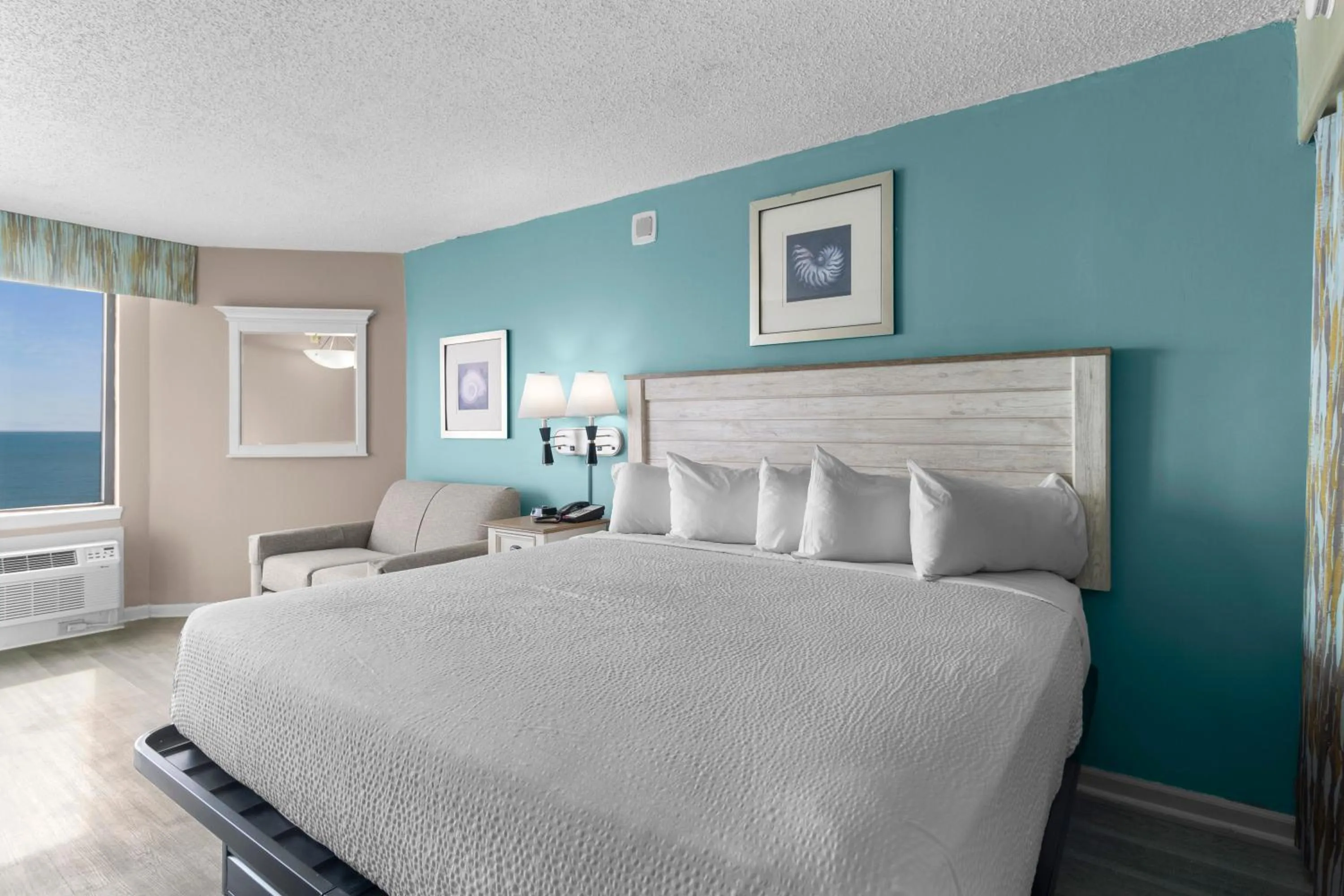 Bedroom, Bed in The Strand - A Boutique Resort