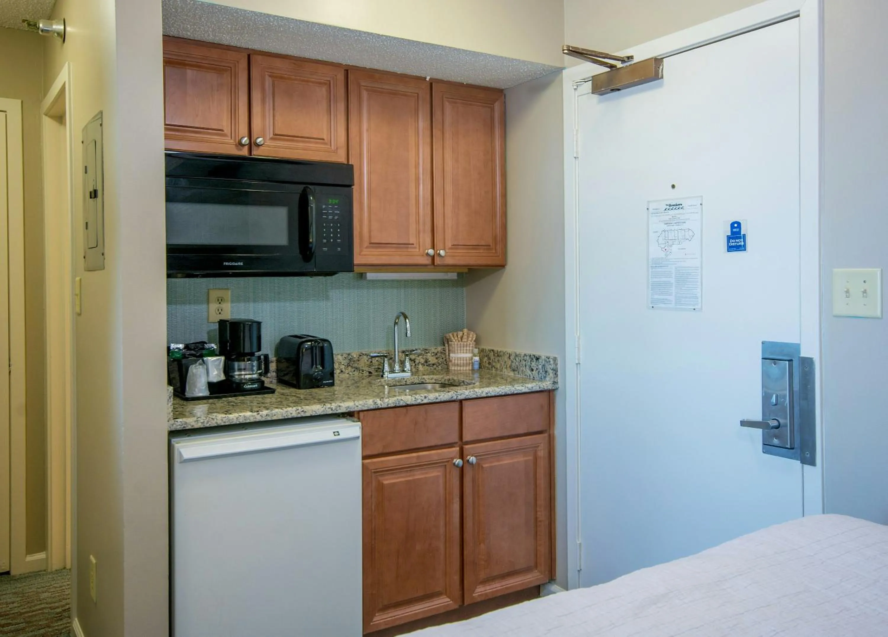 Kitchen or kitchenette in The Strand - A Boutique Resort