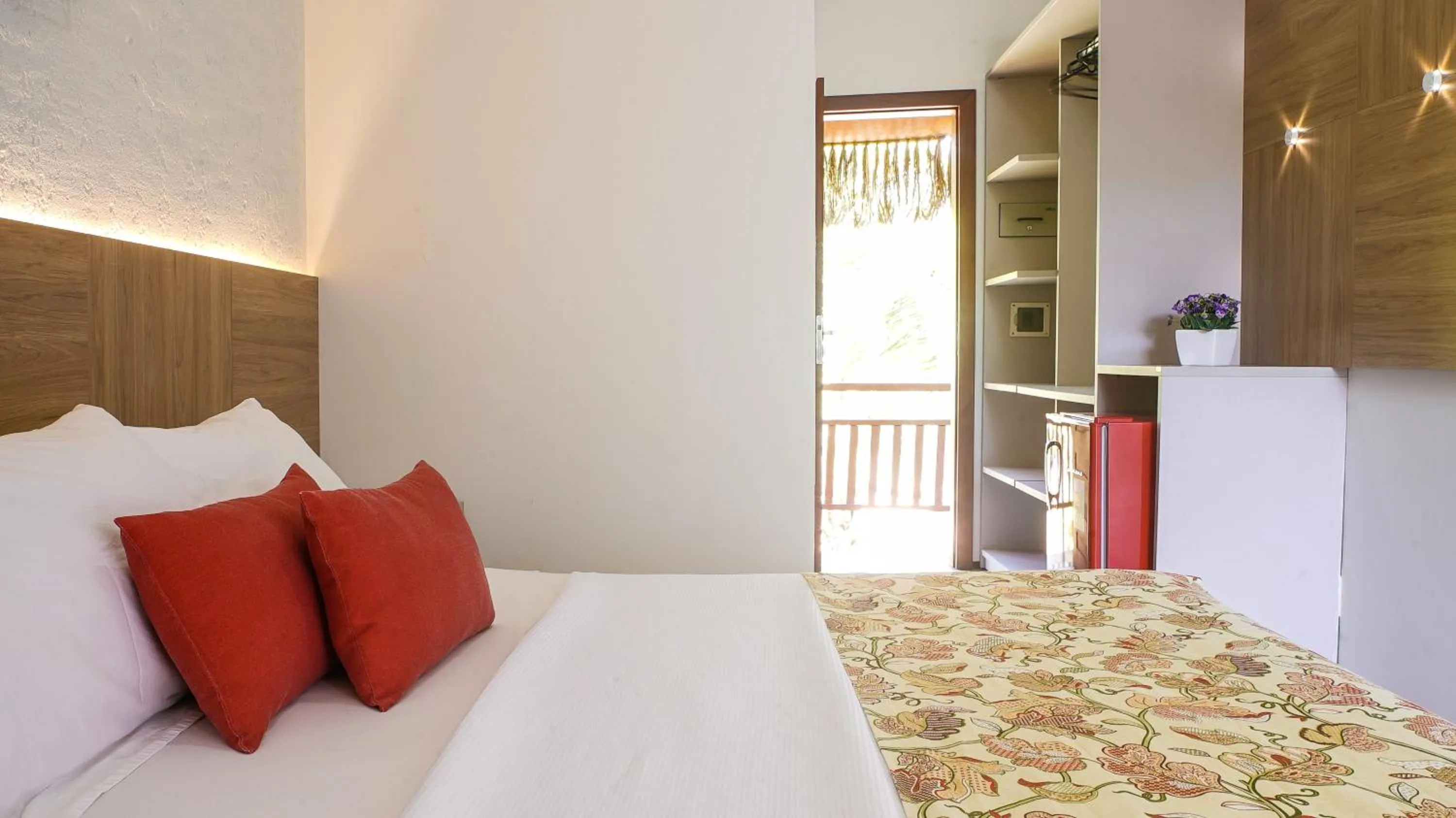 Bed in Kanaloa Pousada