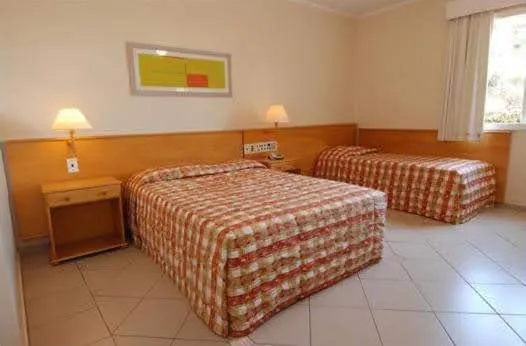 Bed in Jaguary Hotel Sumaré