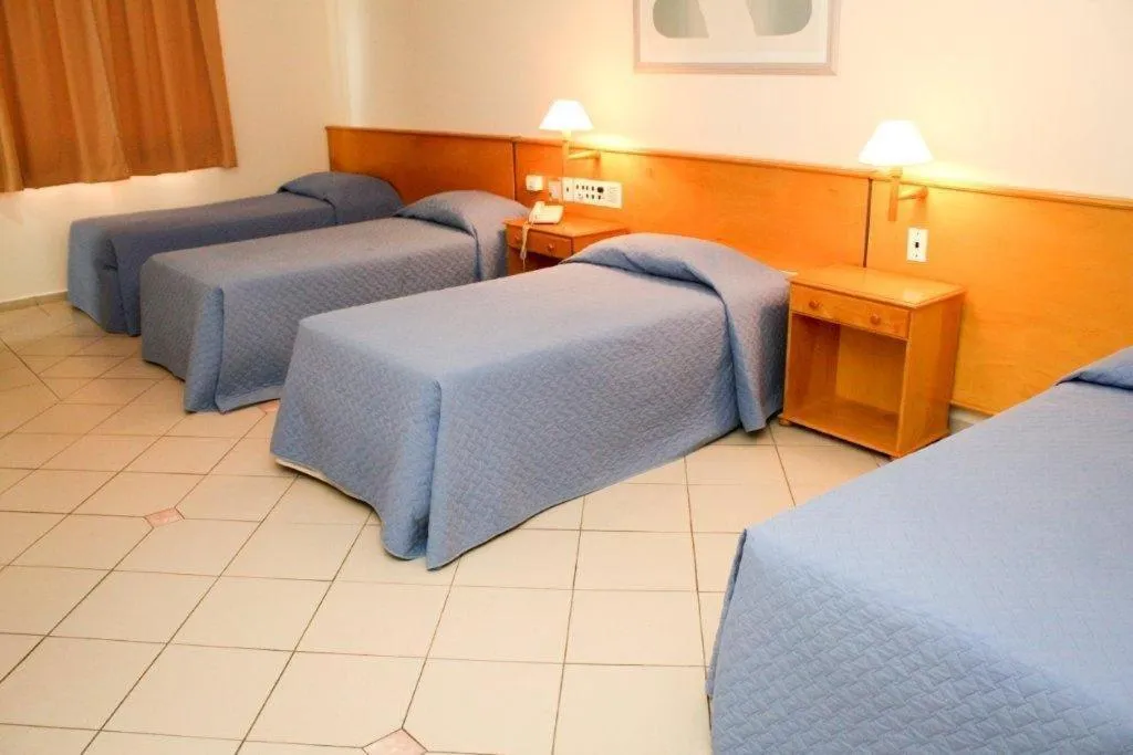 Bed in Jaguary Hotel Sumaré