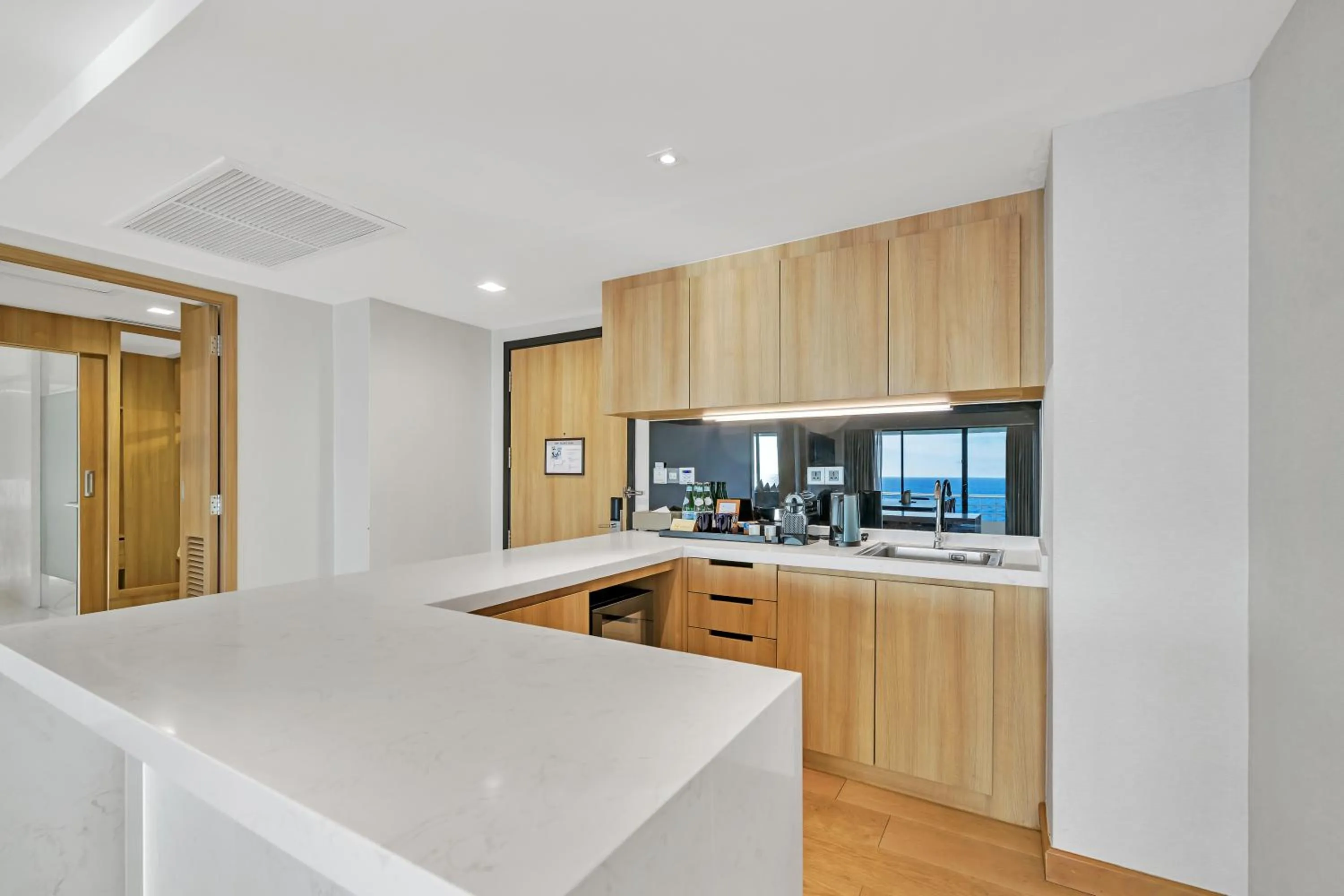 Kitchen or kitchenette in Pullman Phuket Karon Beach Resort