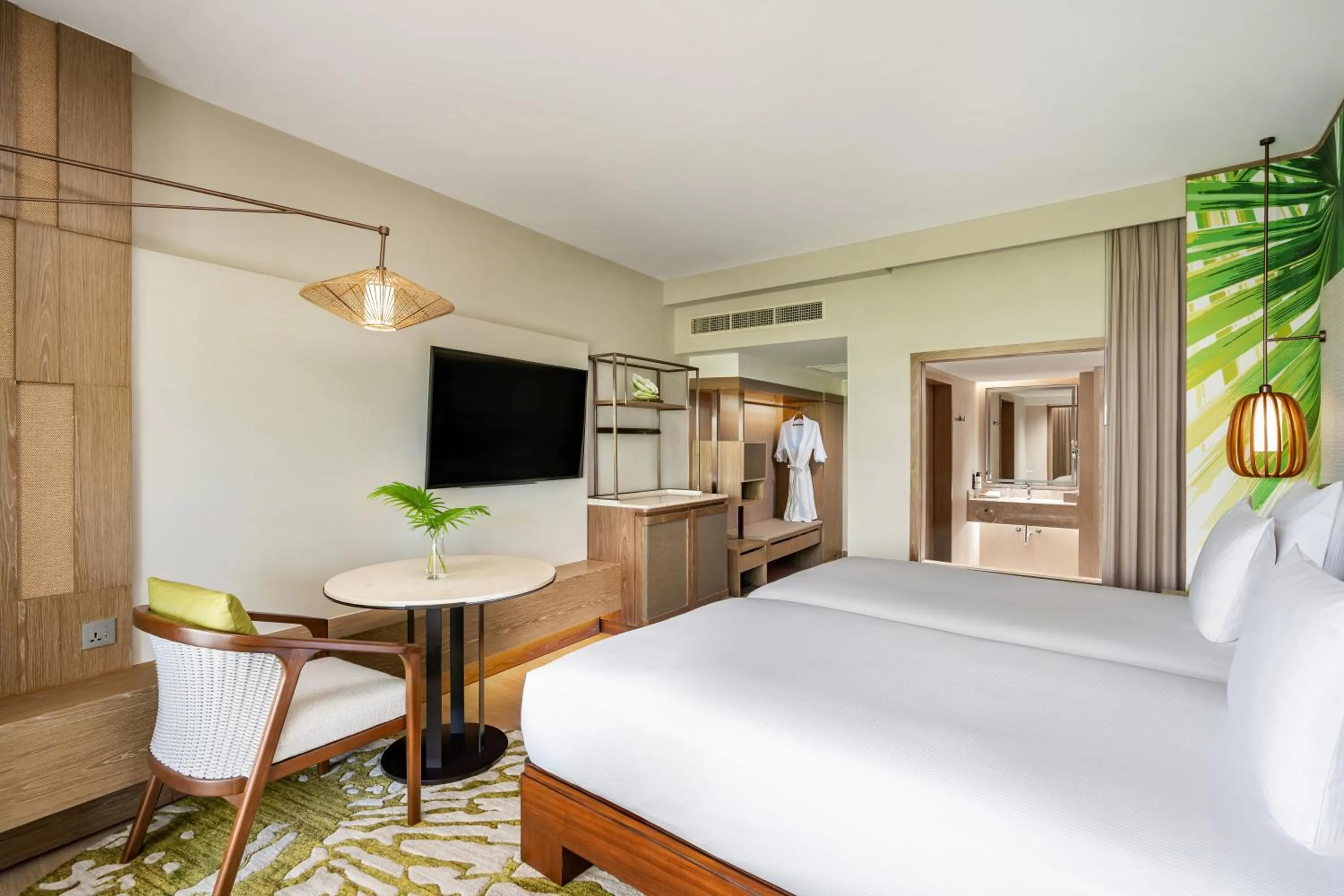 Bed in Pullman Phuket Karon Beach Resort