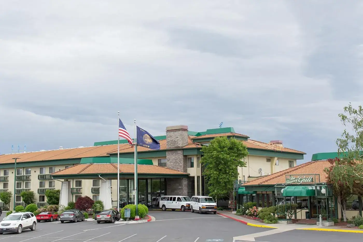 Property building in Rogue Regency Inn & Suites Property building in Rogue Regency Inn & Suites