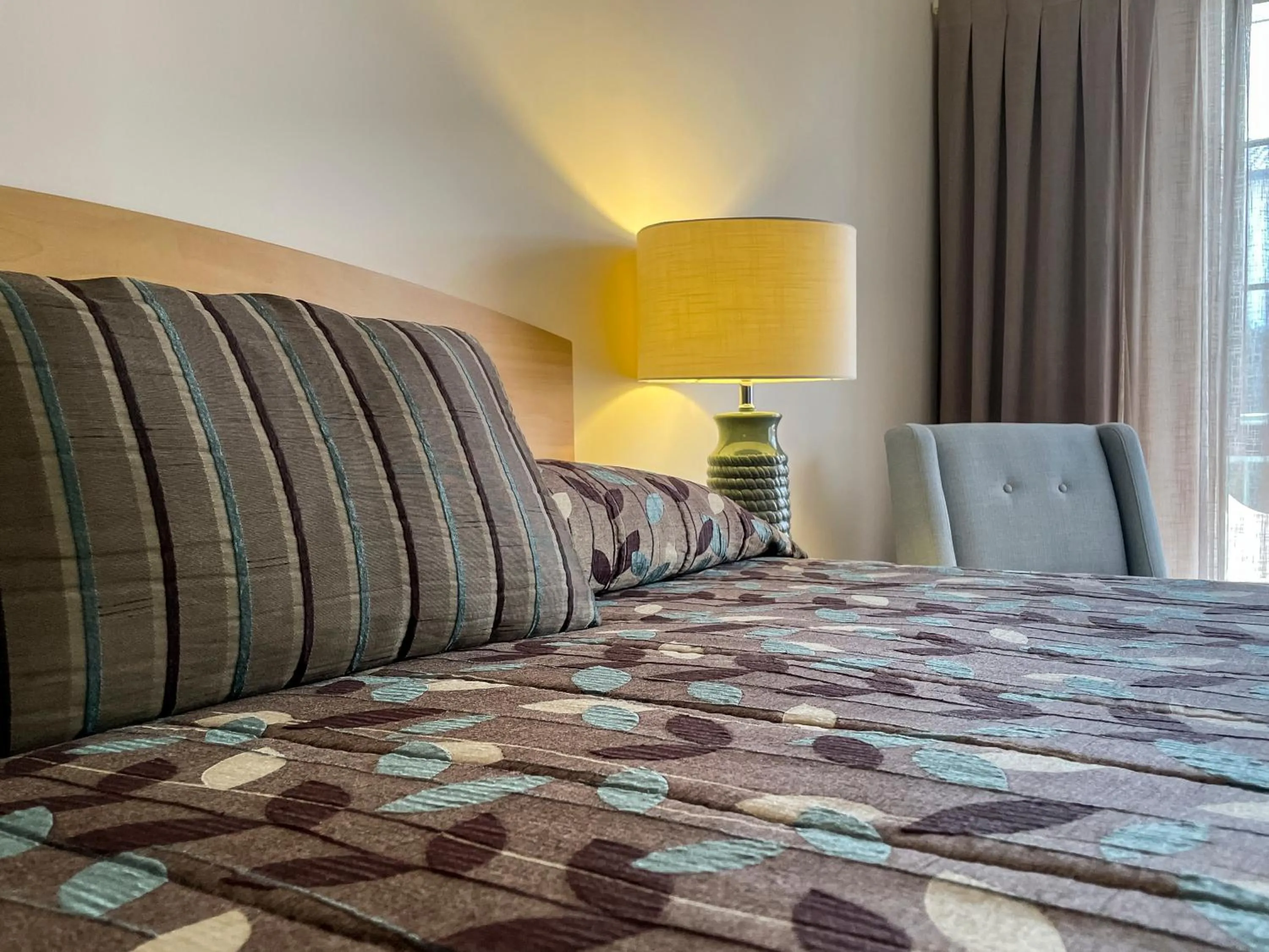 Bed in Greenlane Manor Motel