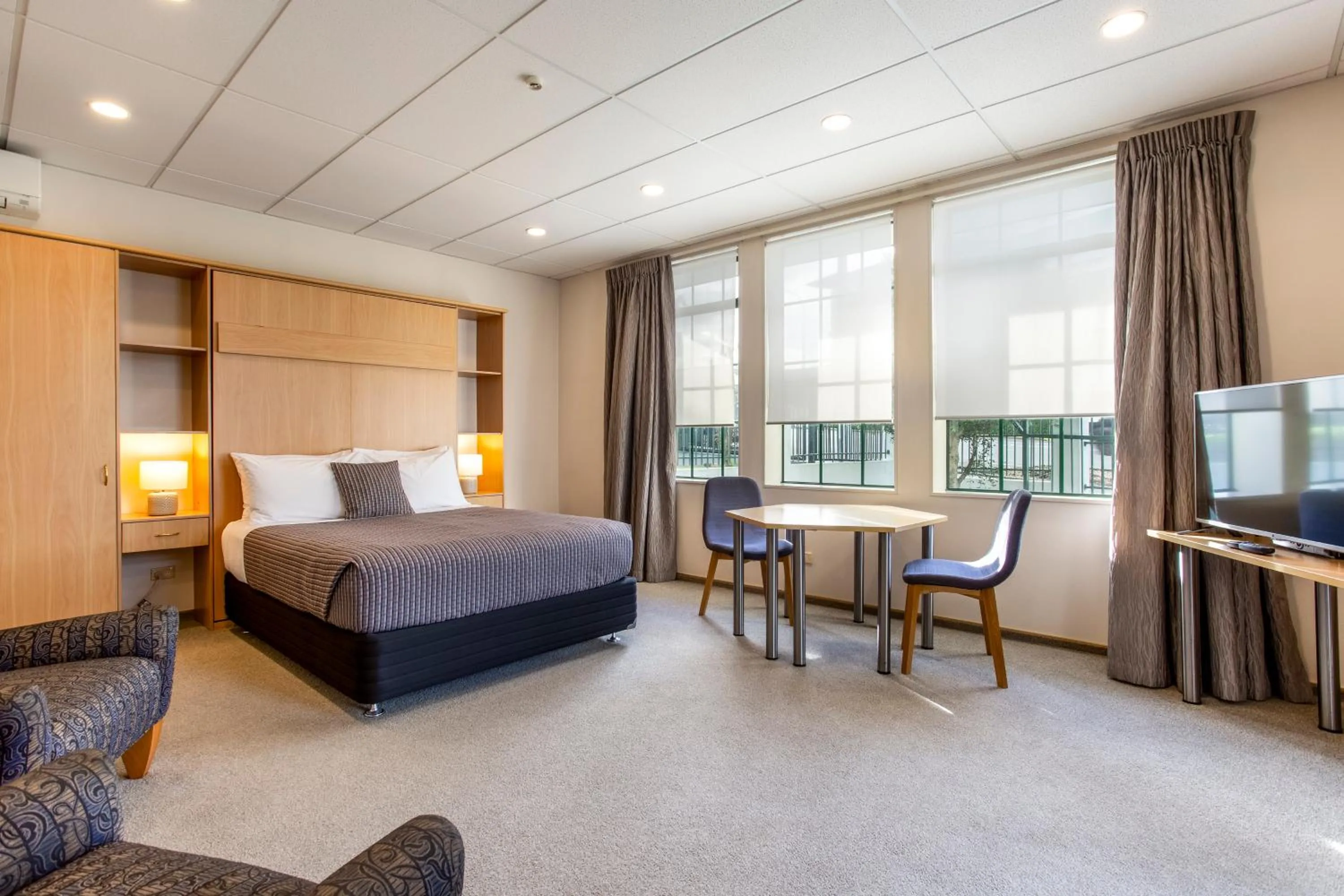 Bed in Greenlane Manor Motel