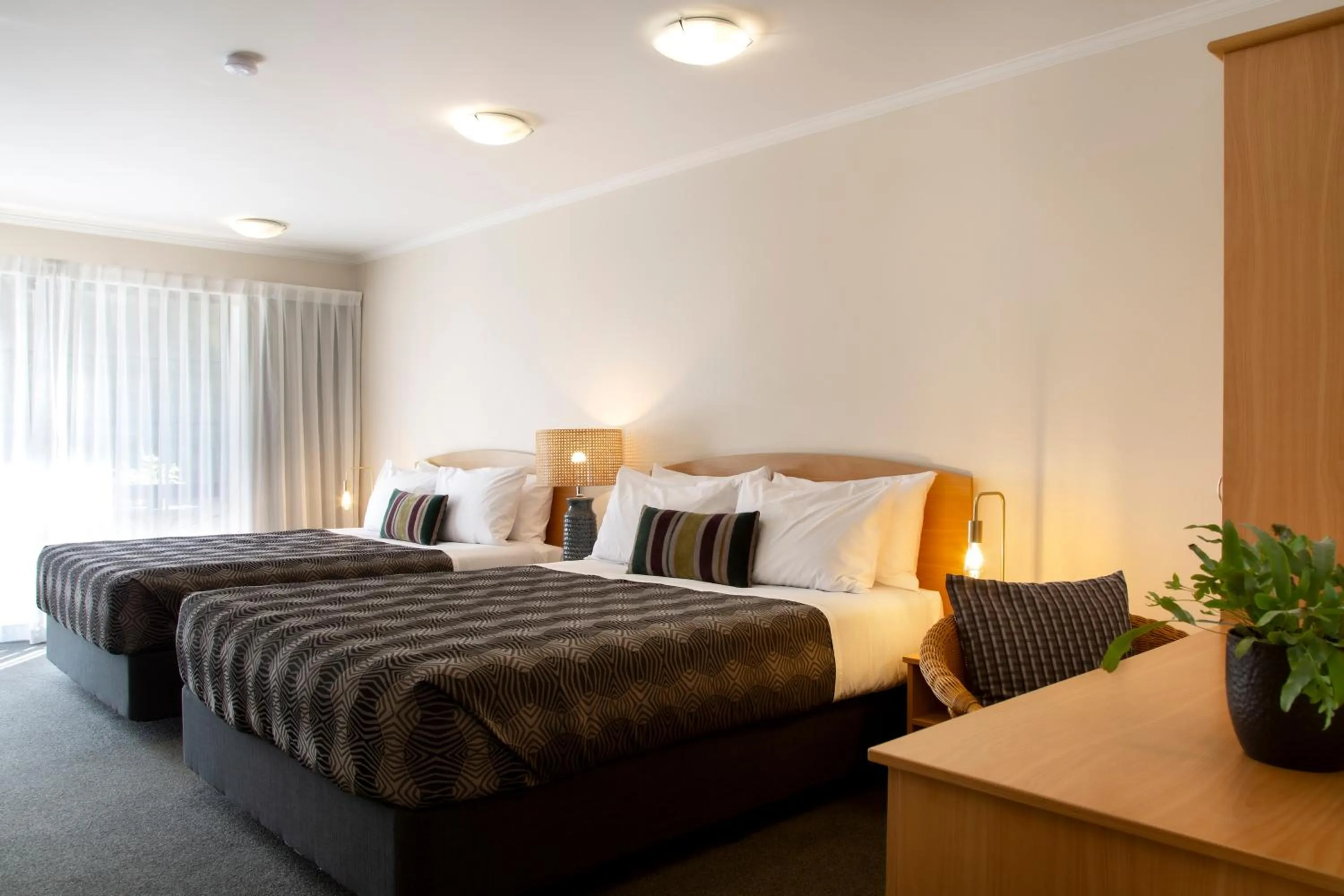 Bed in Greenlane Manor Motel