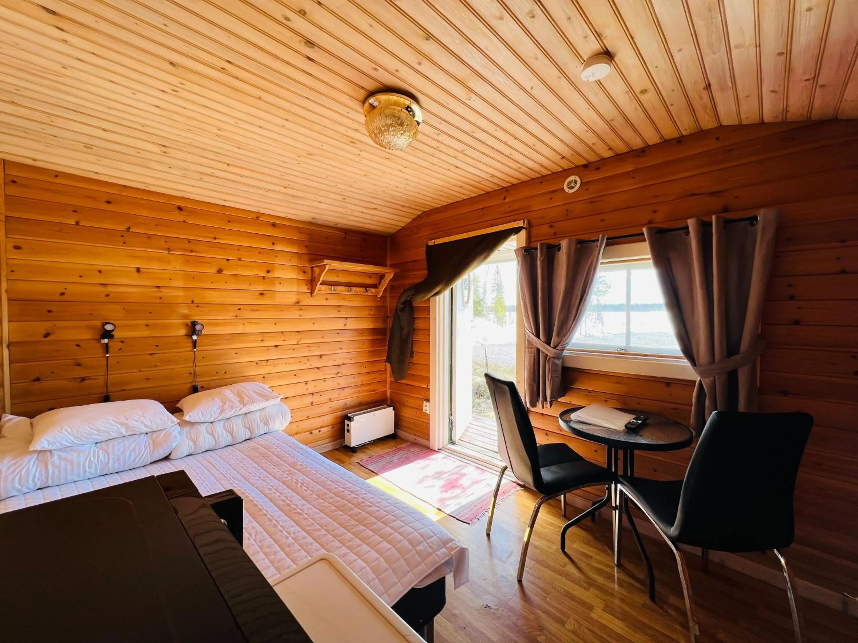 Photo of the whole room, Bed in Camp Alta Kiruna