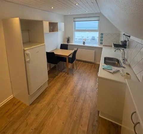 Kitchen or kitchenette in B&B by the Sea Hirtshals