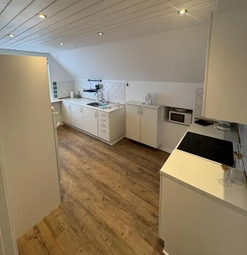 Kitchen or kitchenette in B&B by the Sea Hirtshals