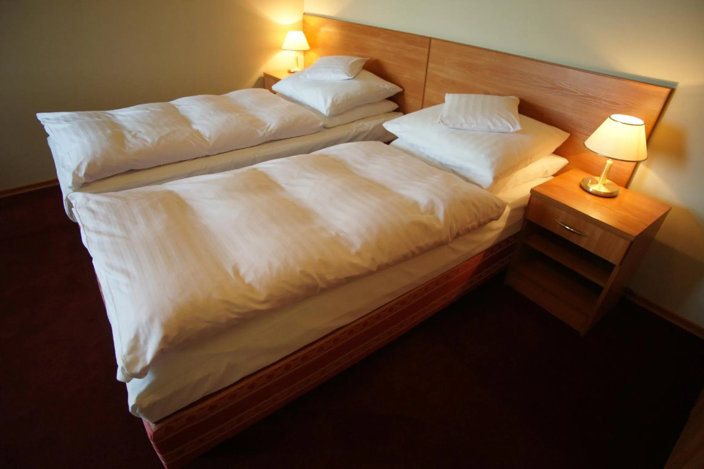 Bed in Hotel Grodzki
