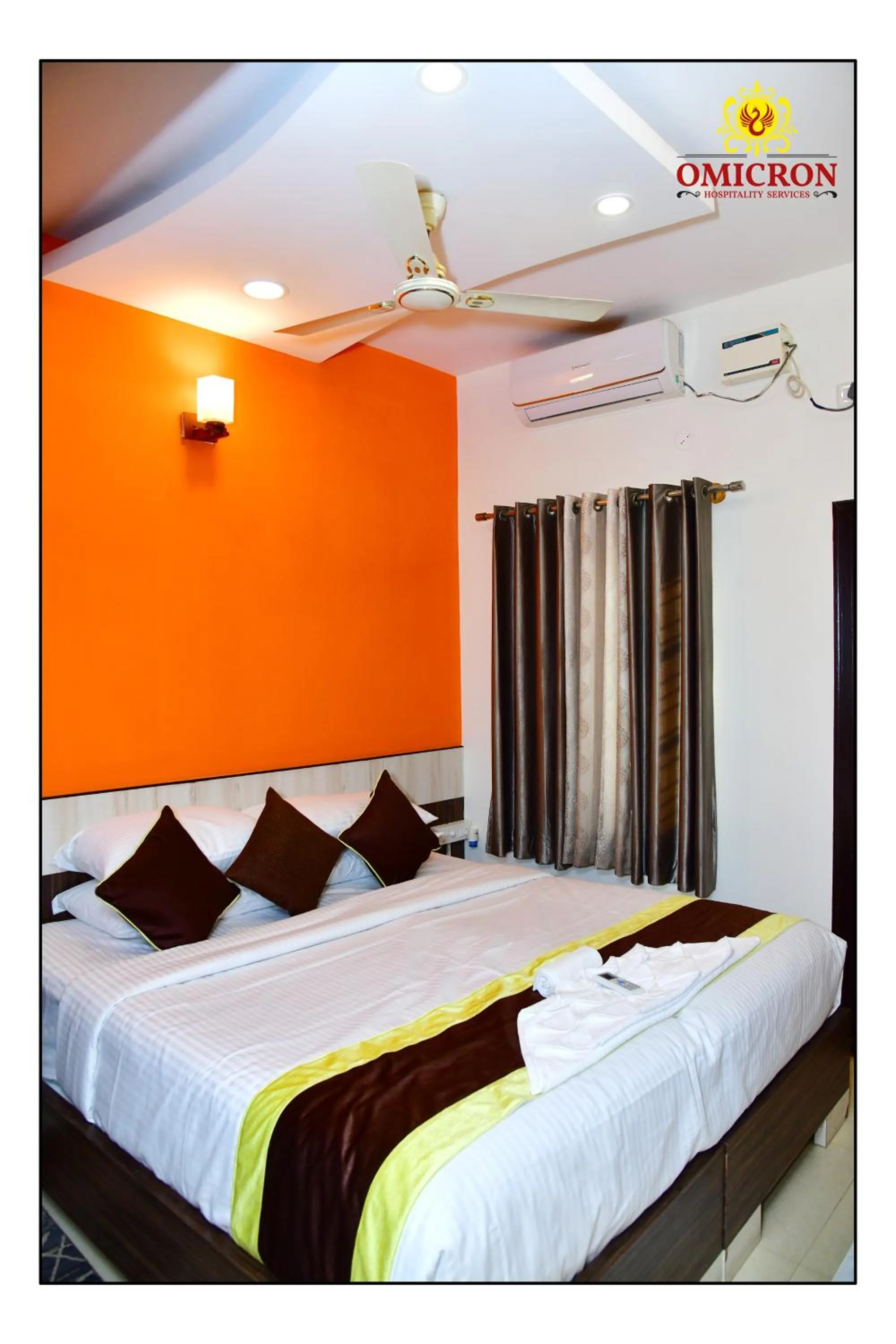 Bed in Hotel Omicron 1 BHK Studio room