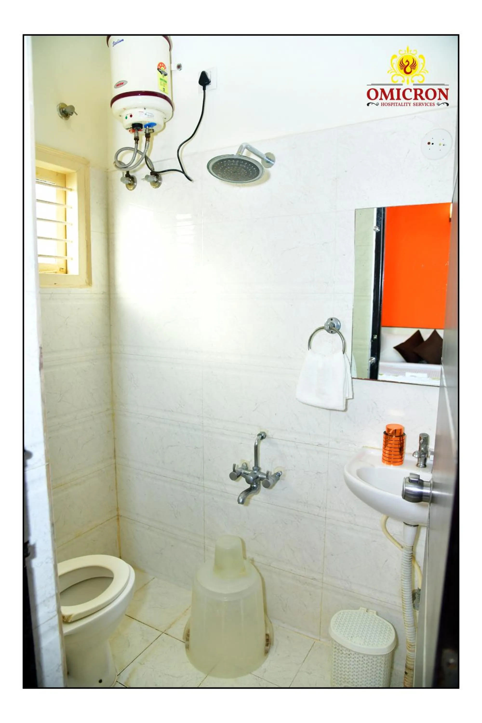 Bathroom in Hotel Omicron 1 BHK Studio room
