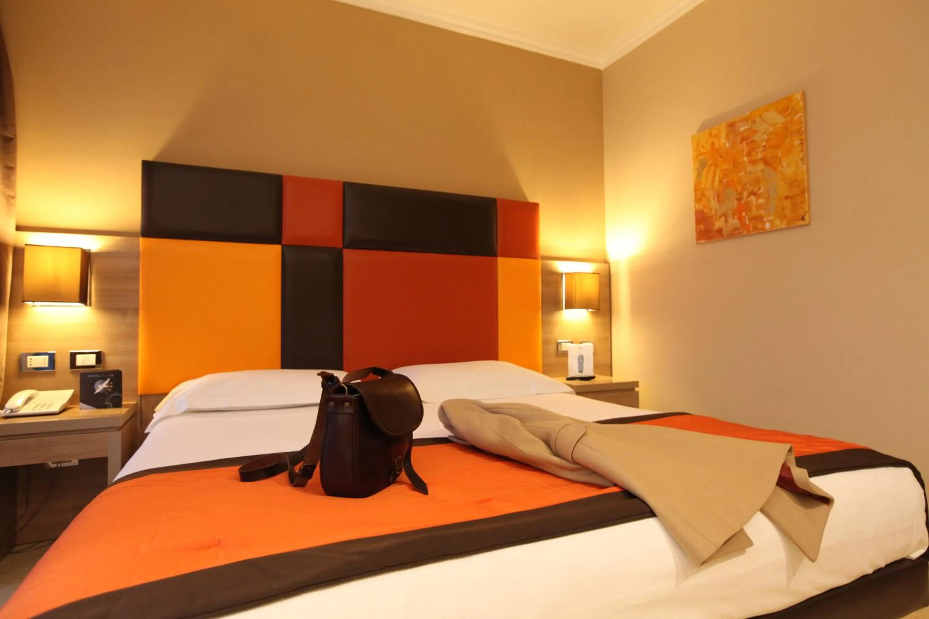 Bed in Hotel Tiber Rooftop & Wellness