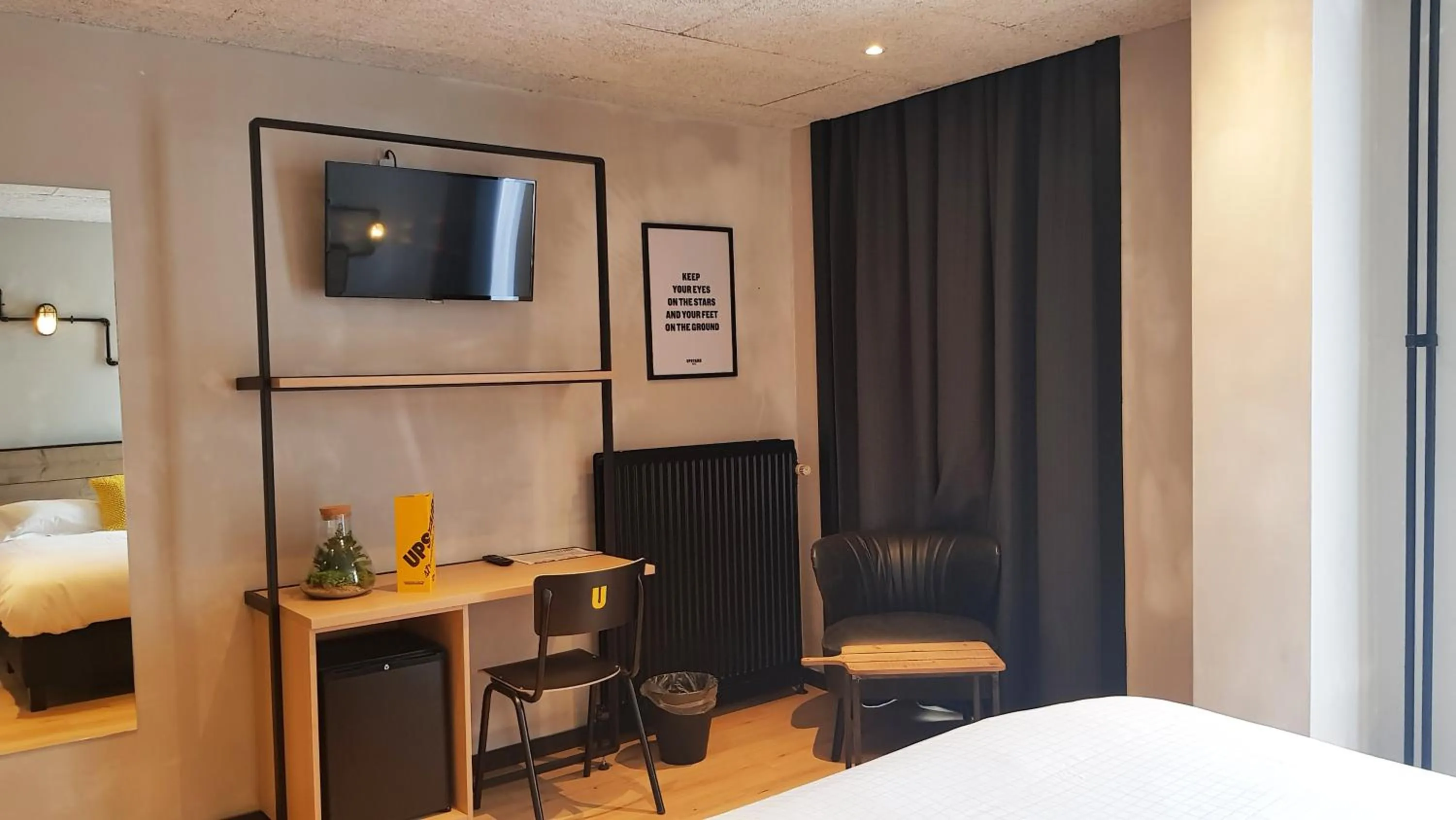 Bed in Upstairs Hotel