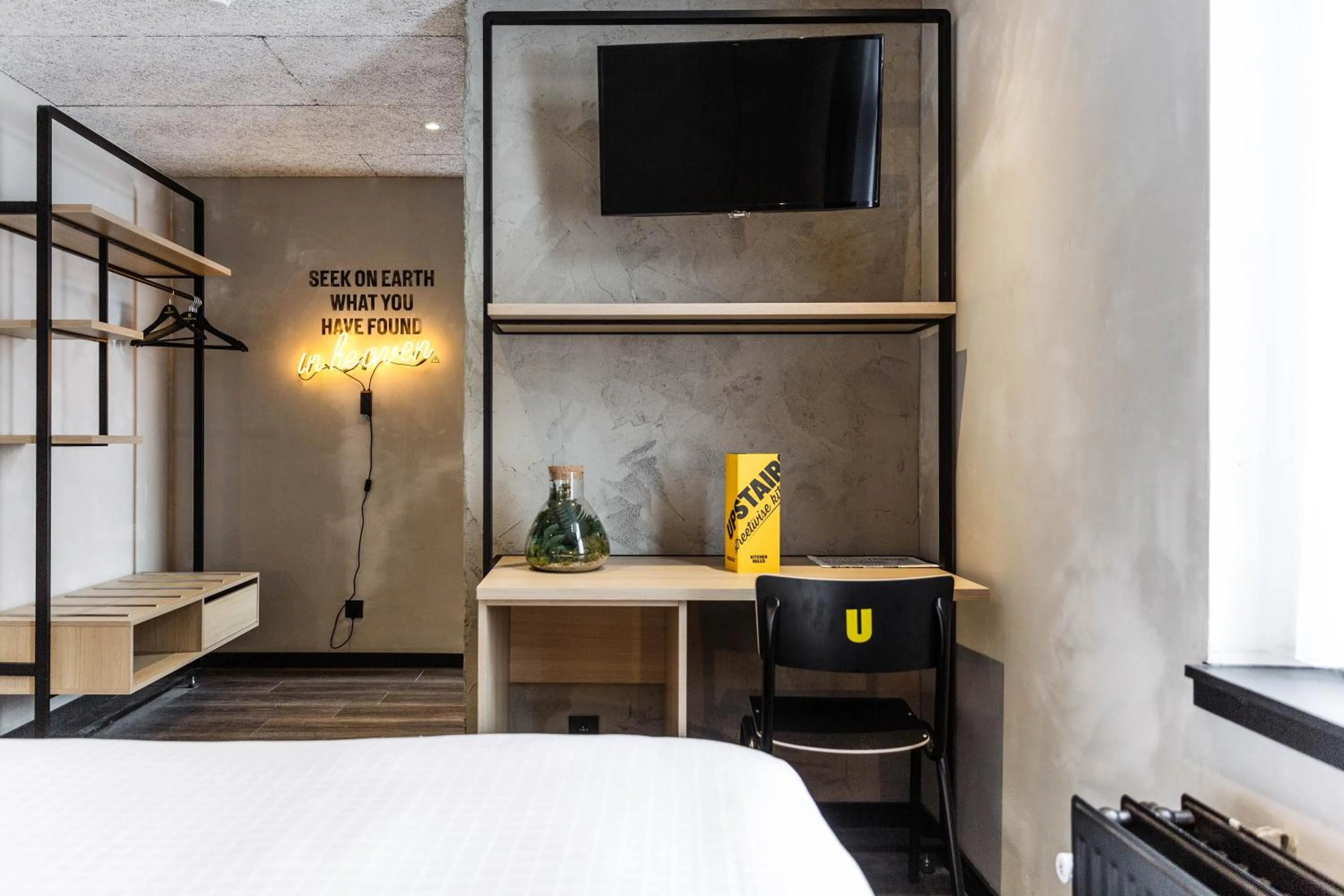 Bed in Upstairs Hotel