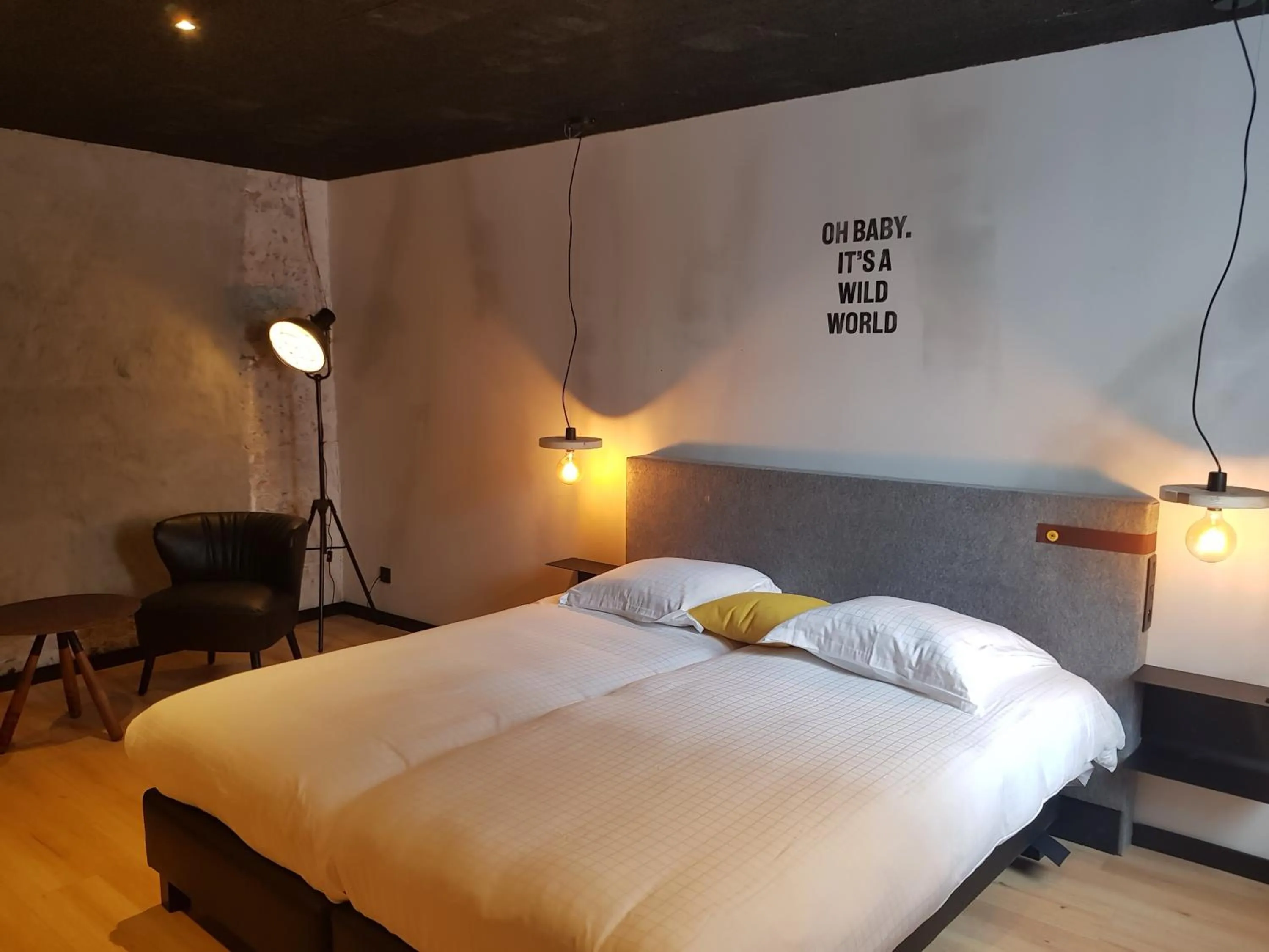 Bed in Upstairs Hotel