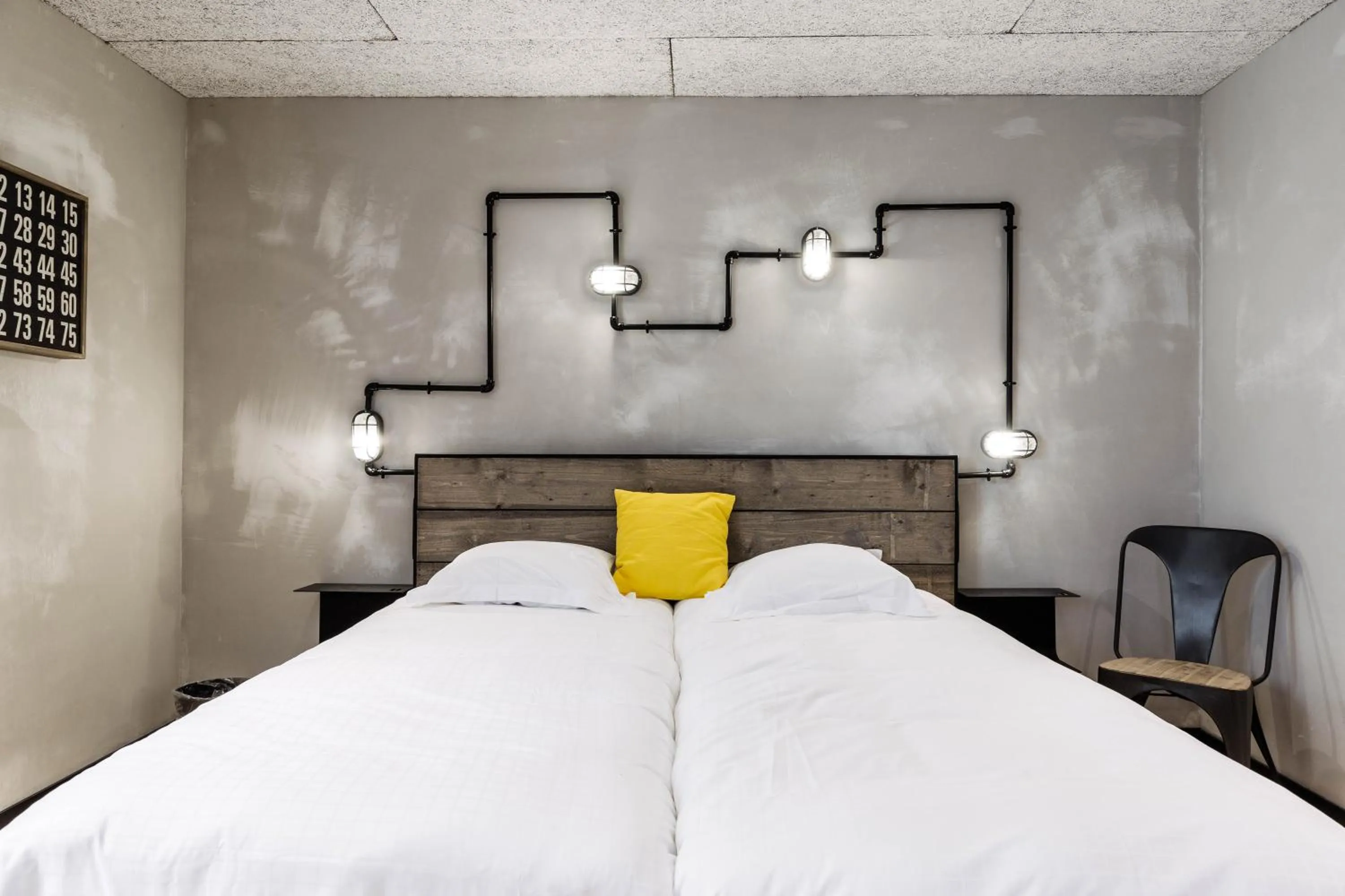 Bed in Upstairs Hotel