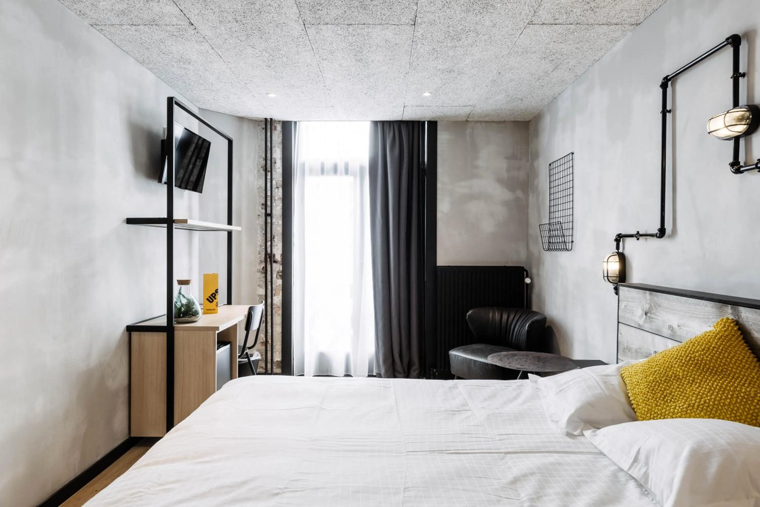 Bed in Upstairs Hotel