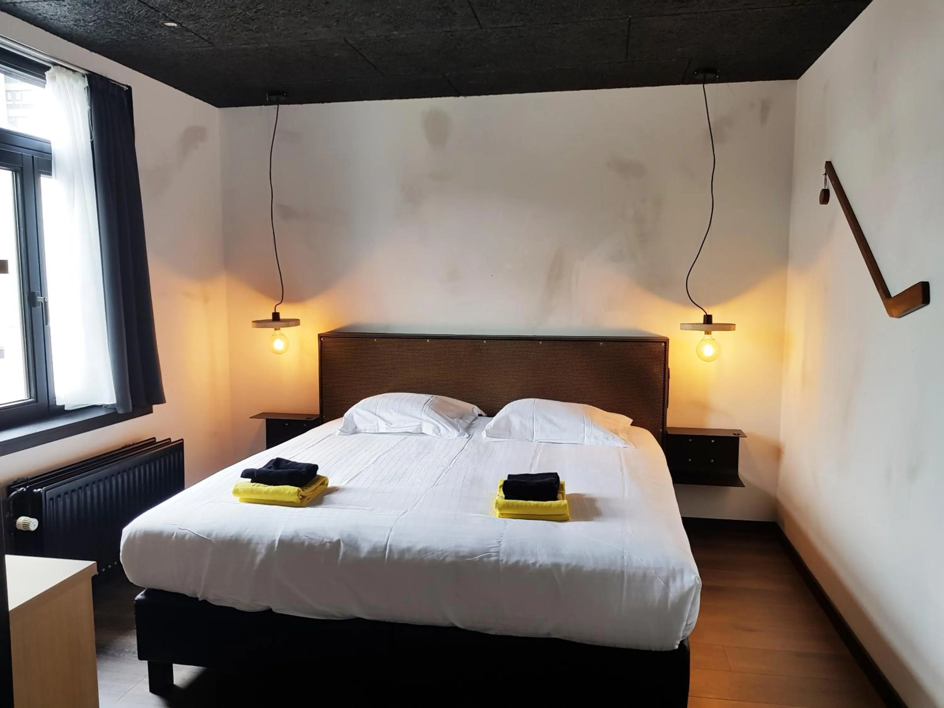 Bed in Upstairs Hotel