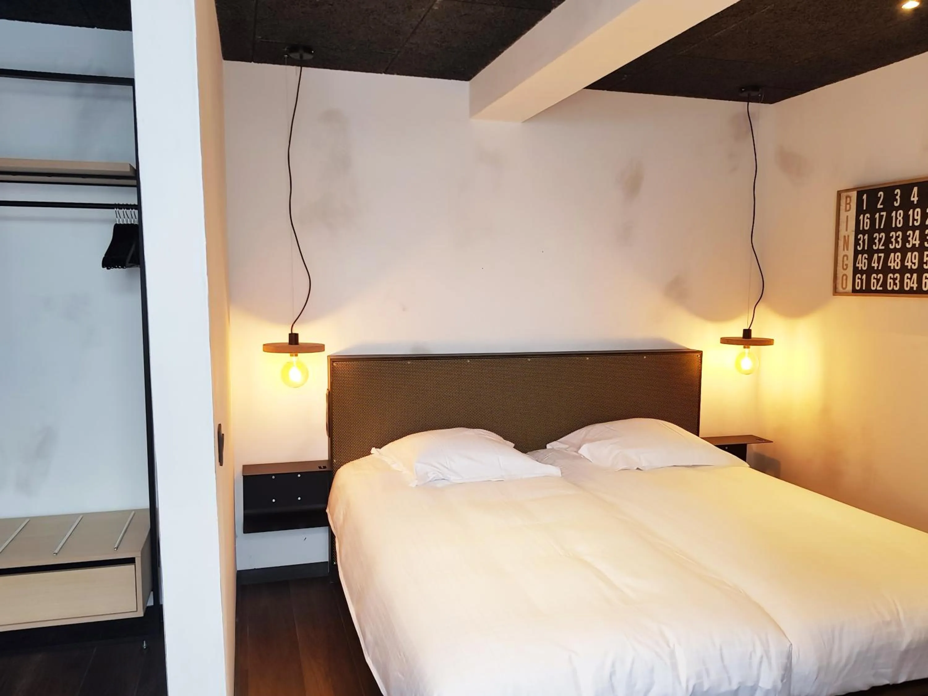 Bed in Upstairs Hotel