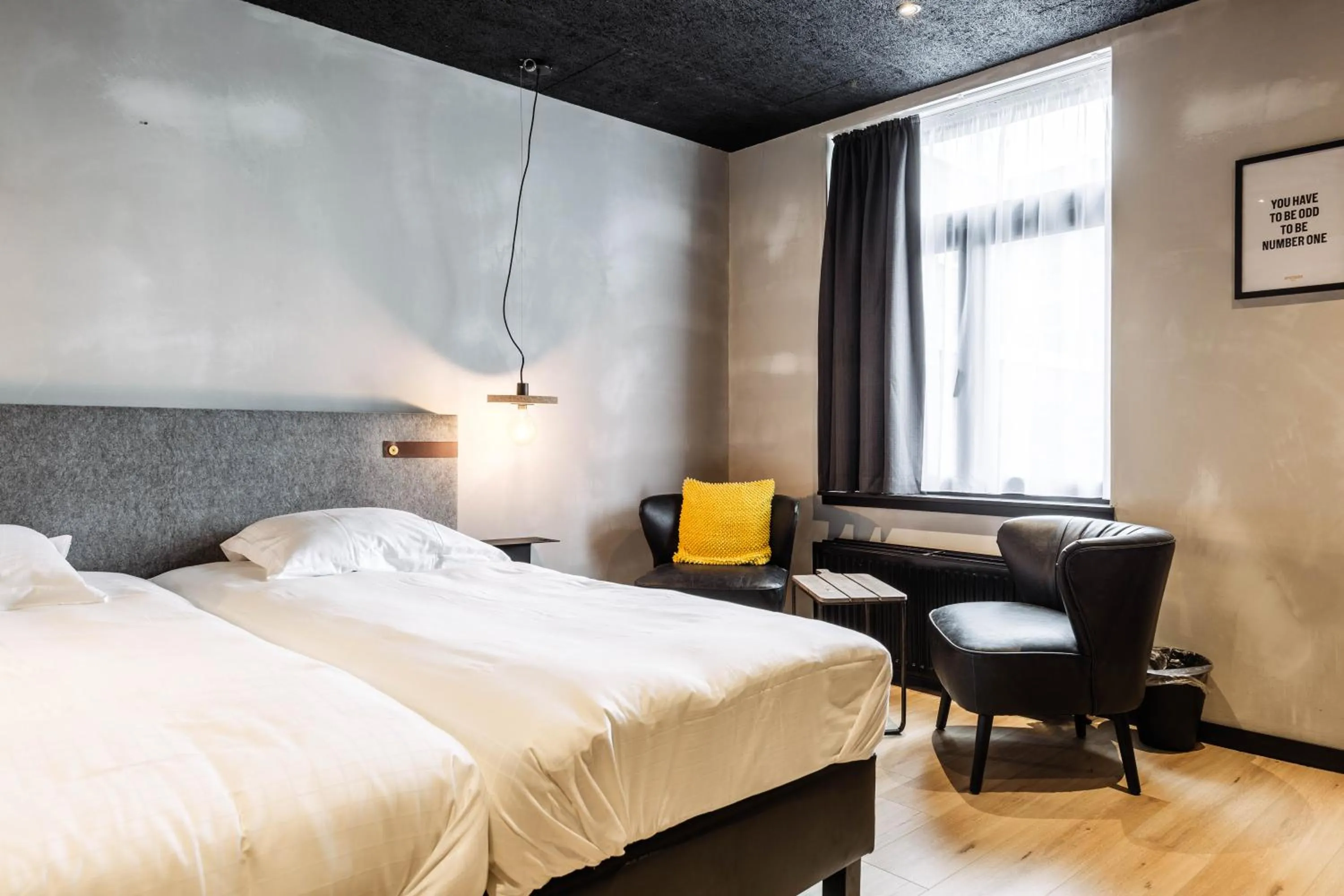 Bed in Upstairs Hotel