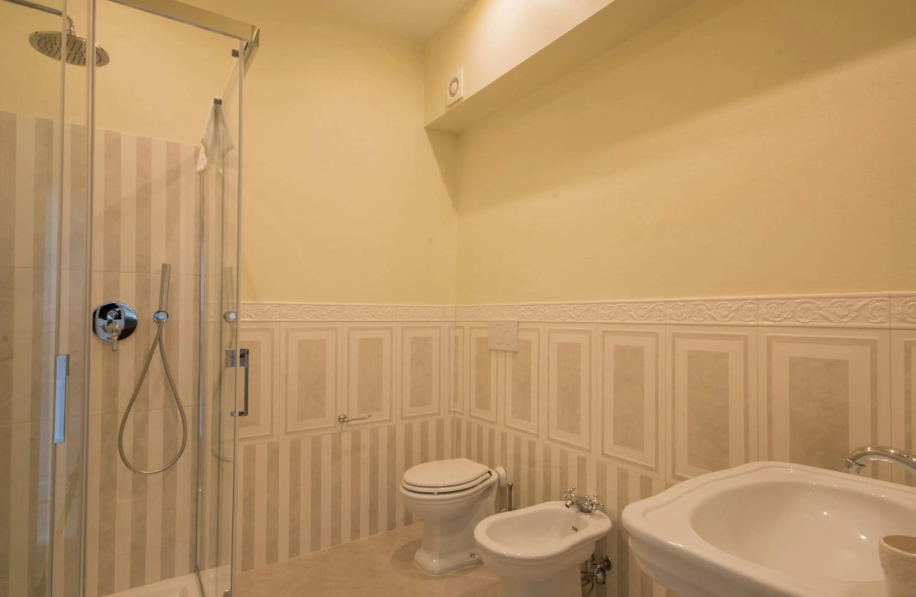 Bathroom in Iris Apartments by Mmega