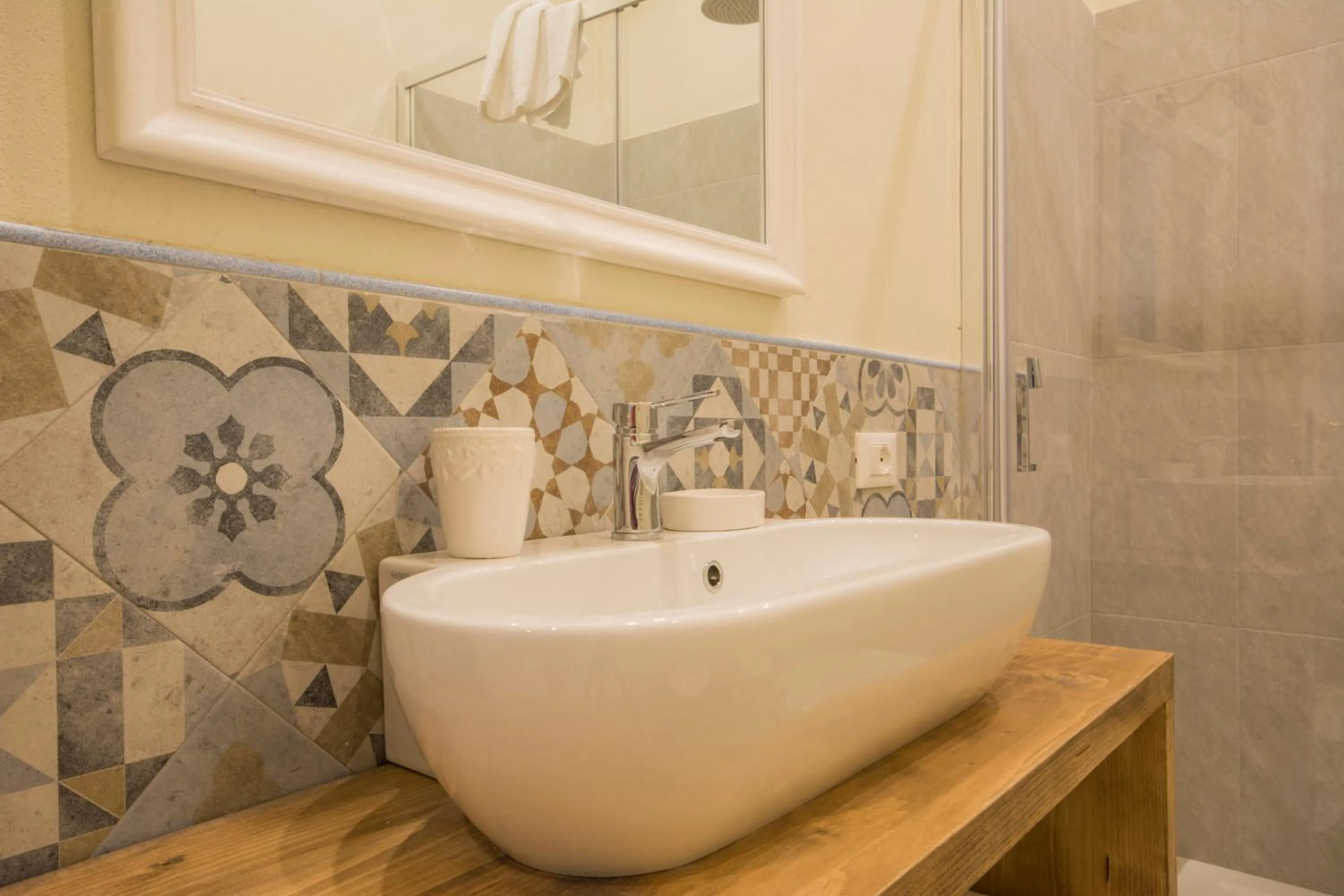 Bathroom in Iris Apartments by Mmega