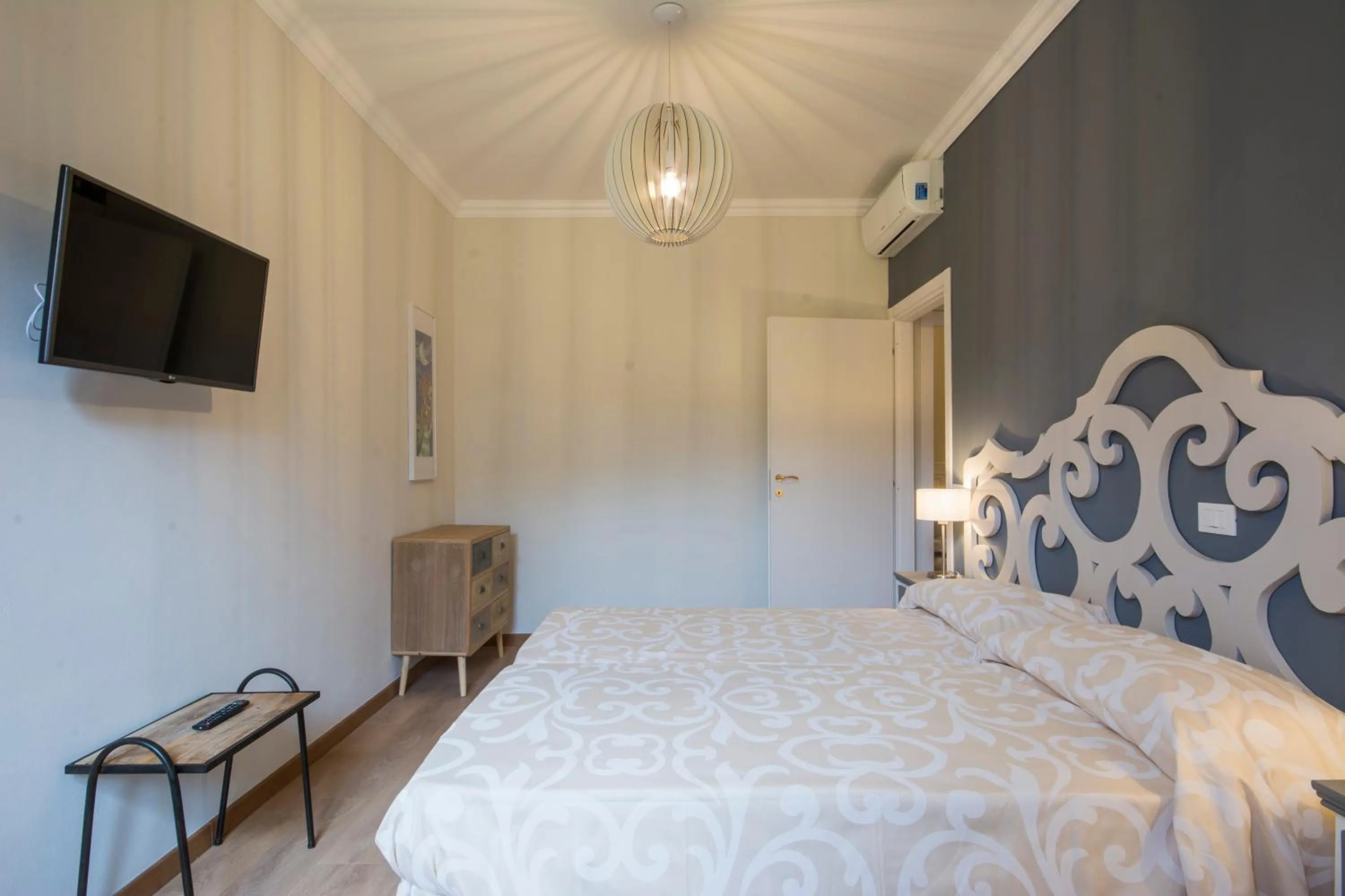 Bedroom, Bed in Iris Apartments by Mmega