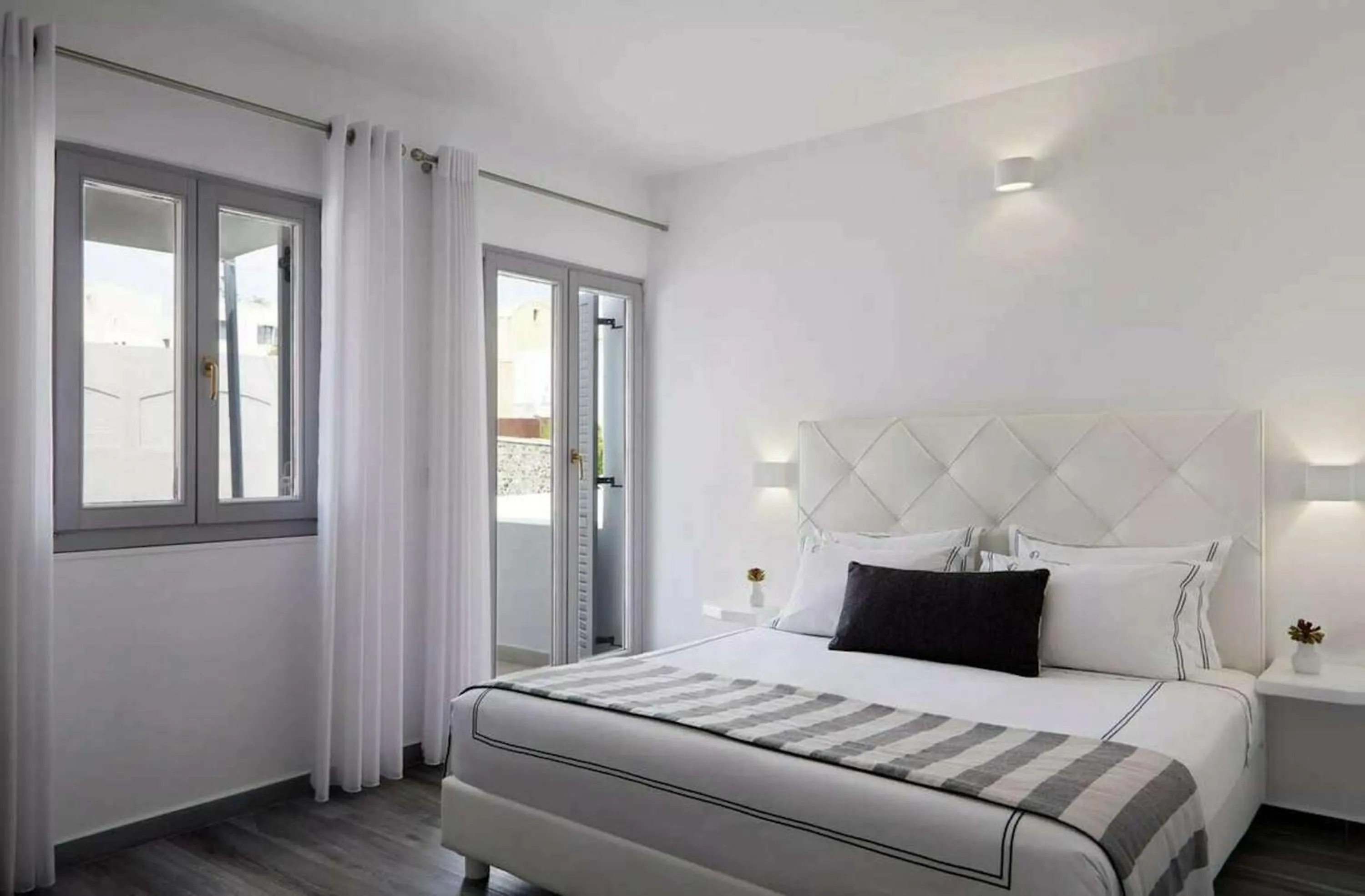 Bed in Kalisti Hotel & Suites