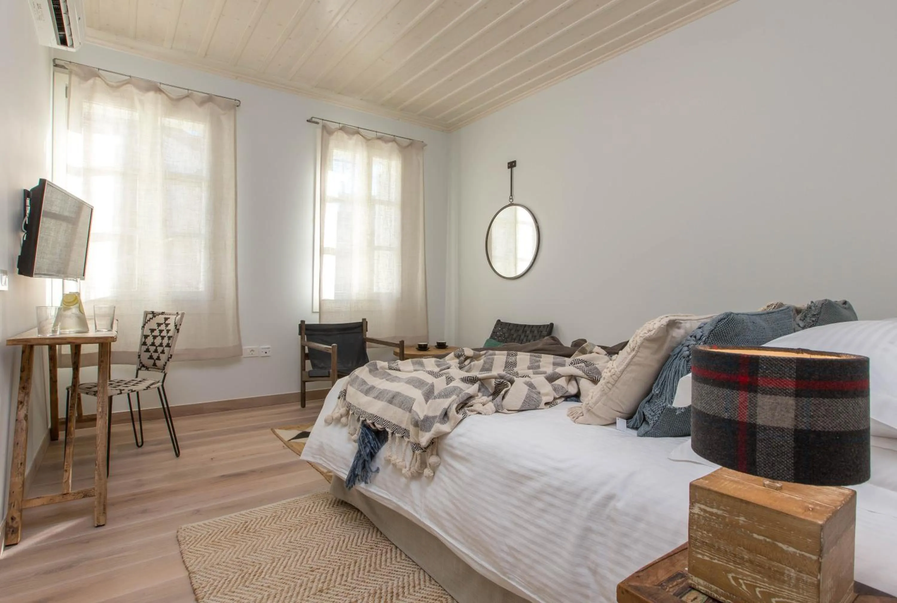 Bed in Amymone Suites